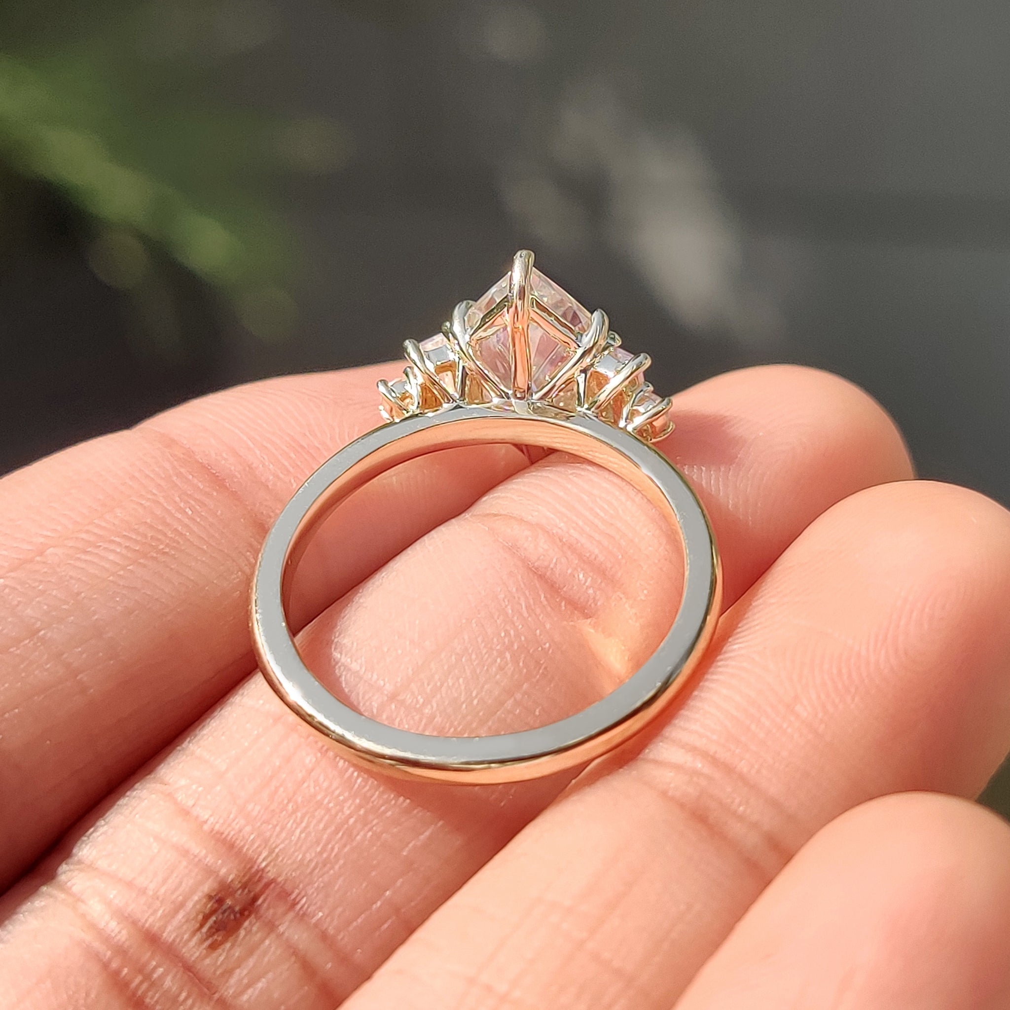 Carat diamonds ring featuring moissanite engagement ring with five stone design.
