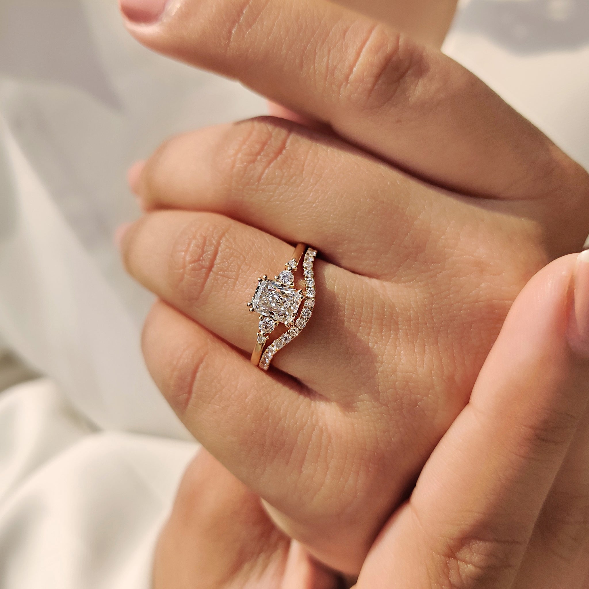 Double prong radiant cut engagement ring.
