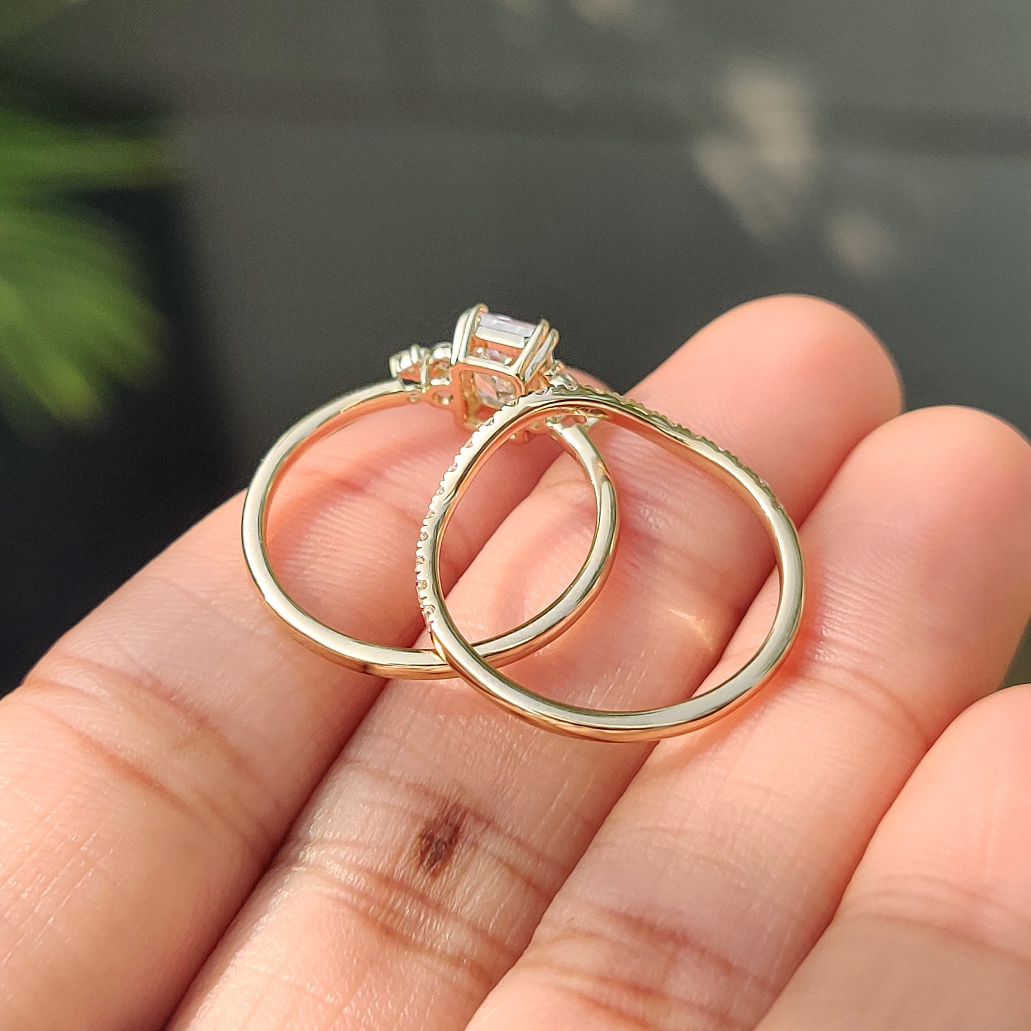 Curved wedding band with radiant ring.

