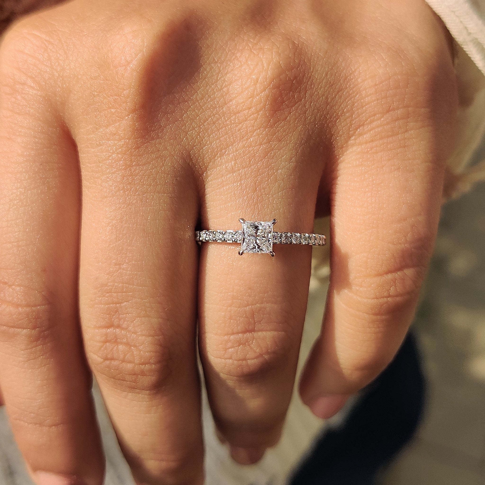 Four claw prong princess cut engagement ring
