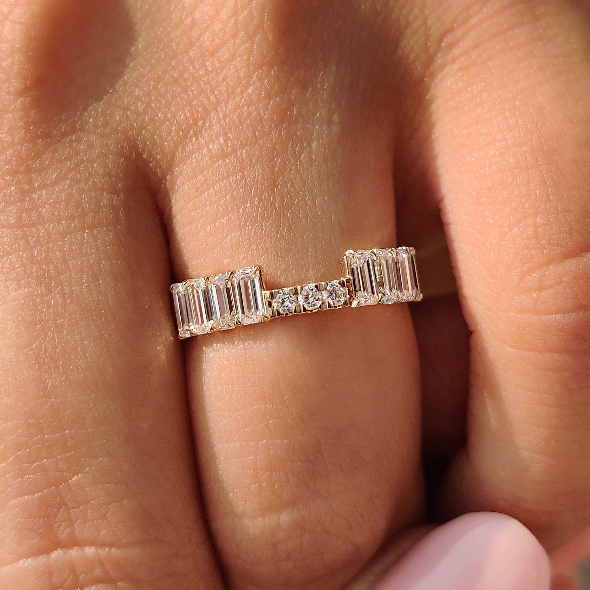 Half eternity stackable wedding band with claw prong setting.
