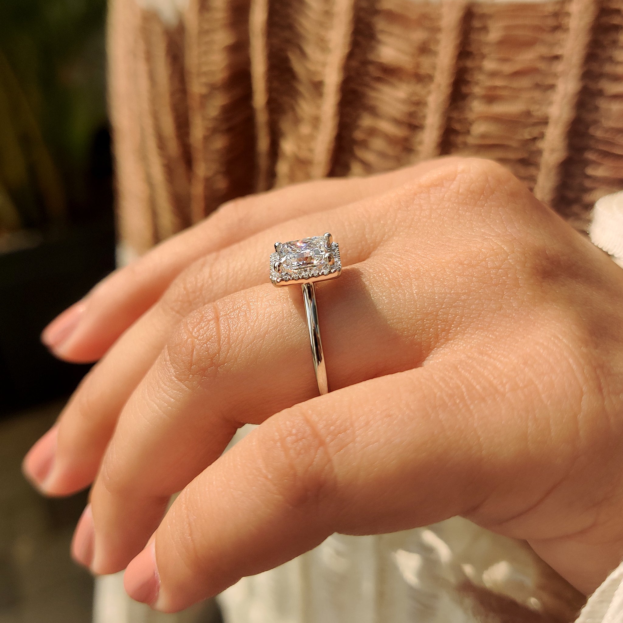 Princess cut diamond ring with round cut halo
