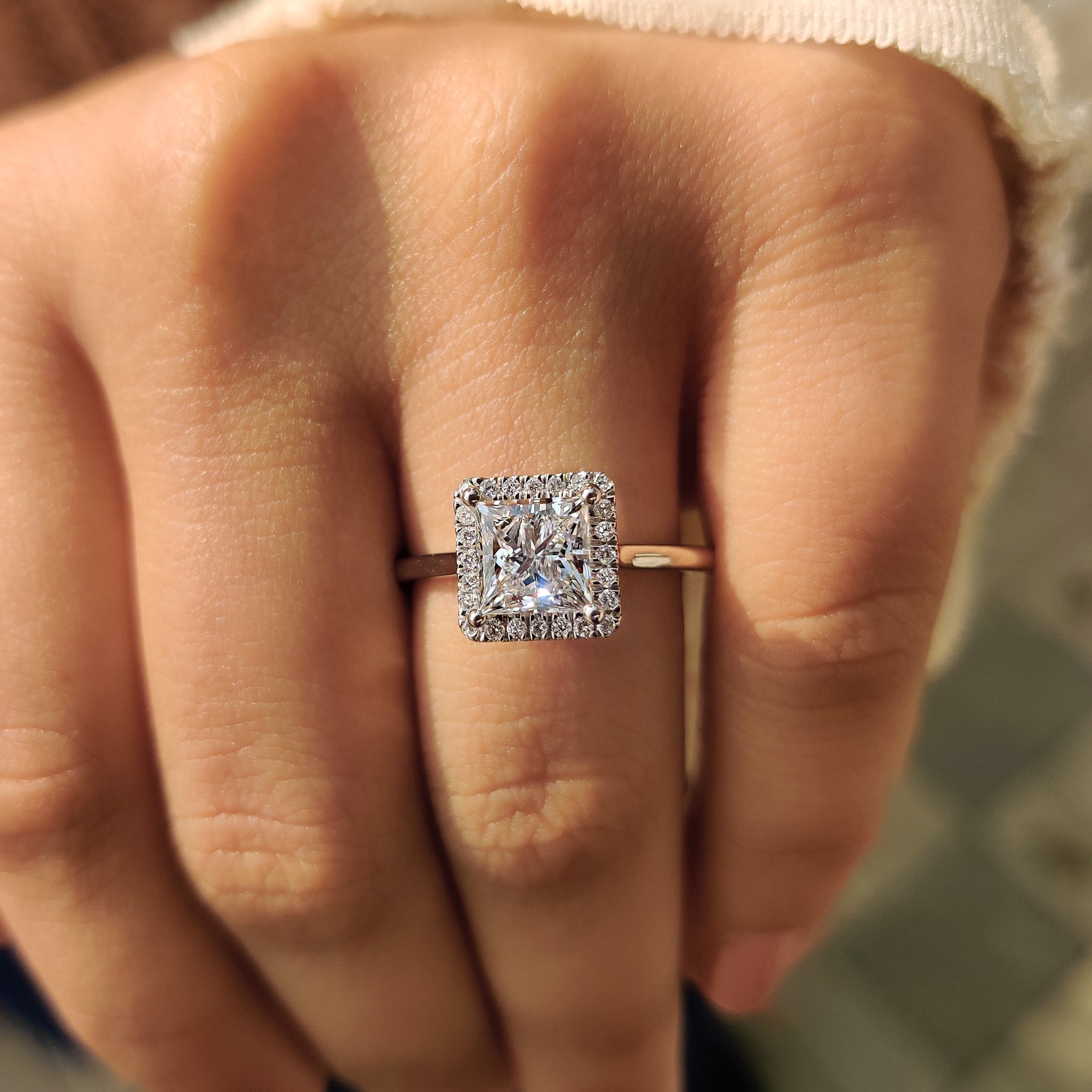 Custom white gold princess cut diamond ring
