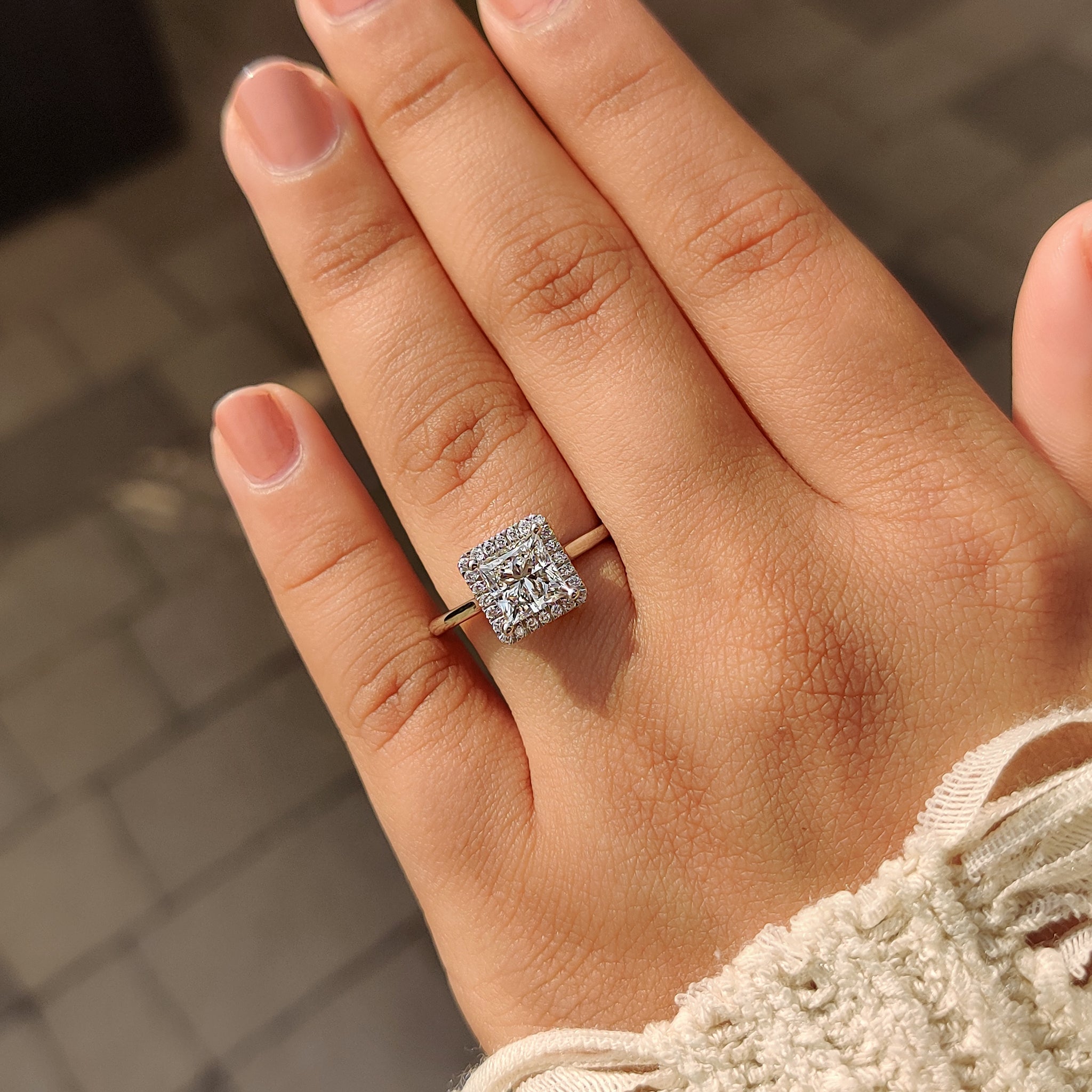 White gold engagement ring with princess cut centre
