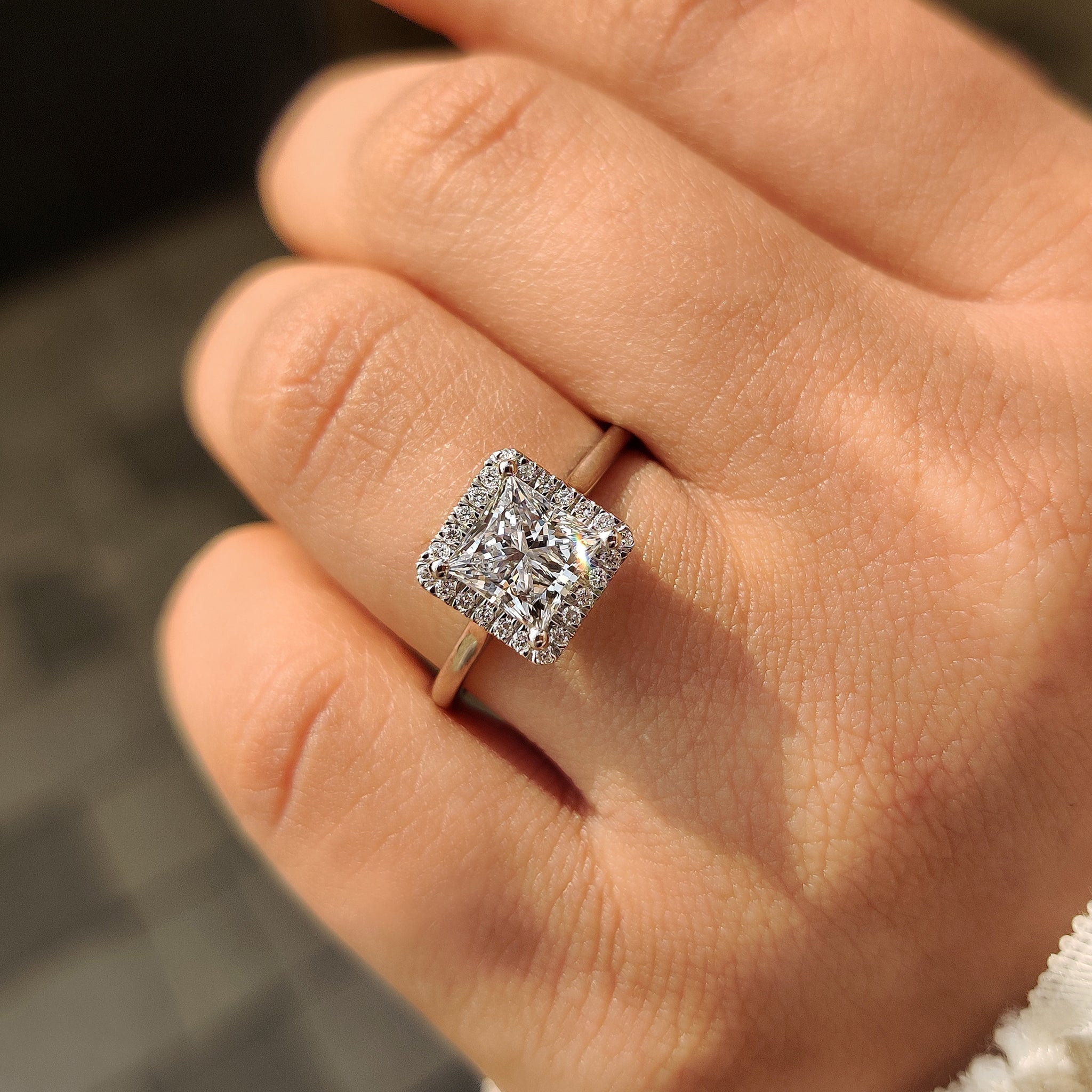 Cathedral setting princess cut engagement ring
