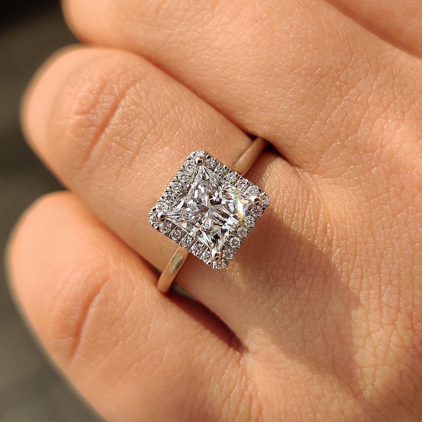 "Halo princess cut engagement ring in white gold
