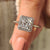 "Halo princess cut engagement ring in white gold
