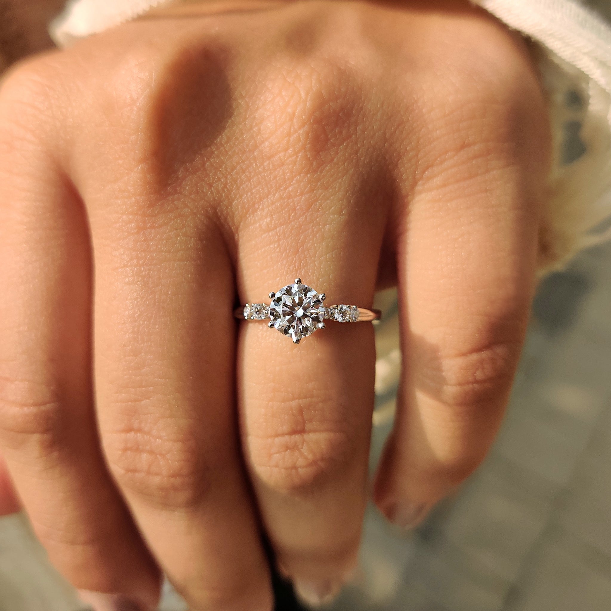 Handmade white gold seven stone diamond ring
