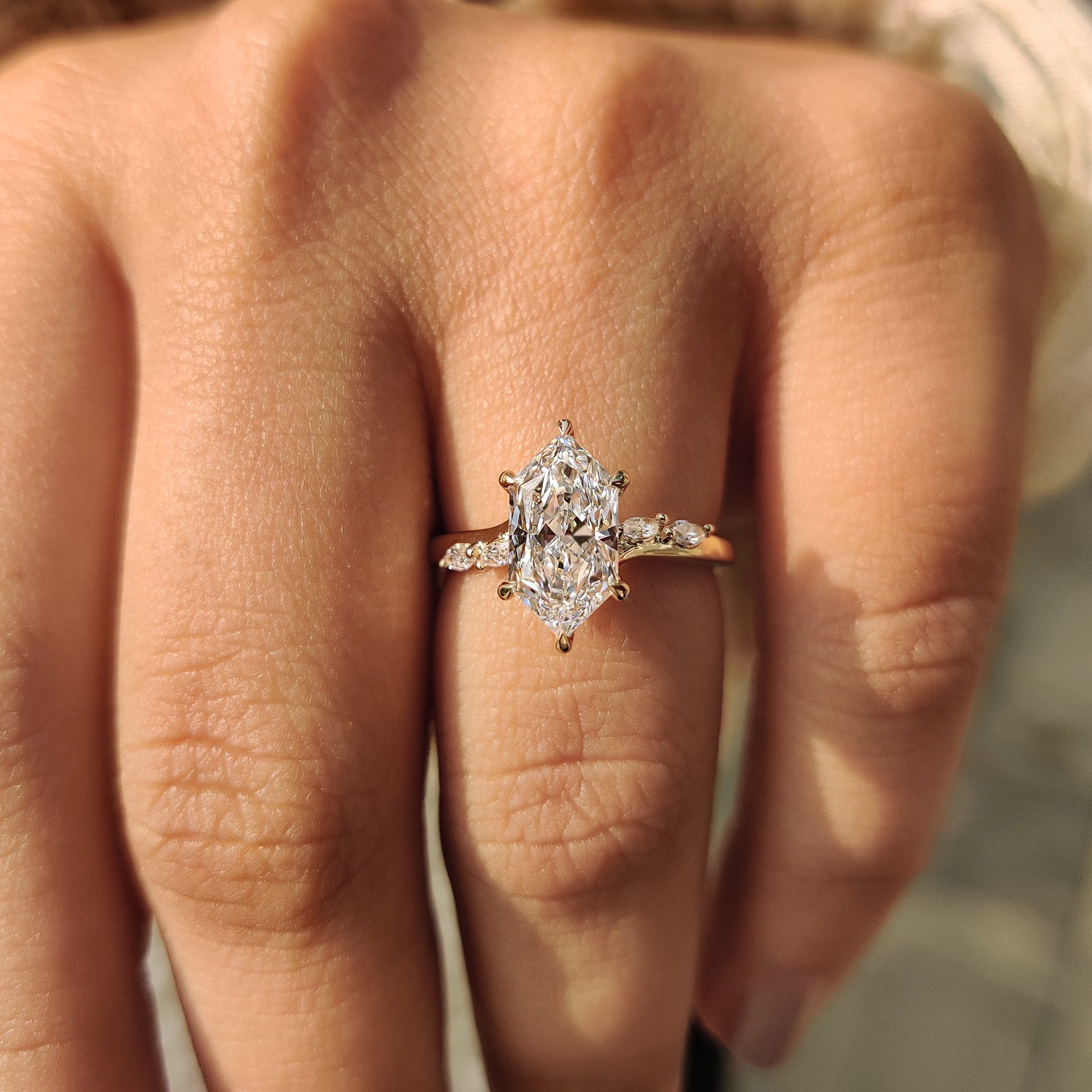 Bridge accent engagement ring with detailed craftsmanship.
