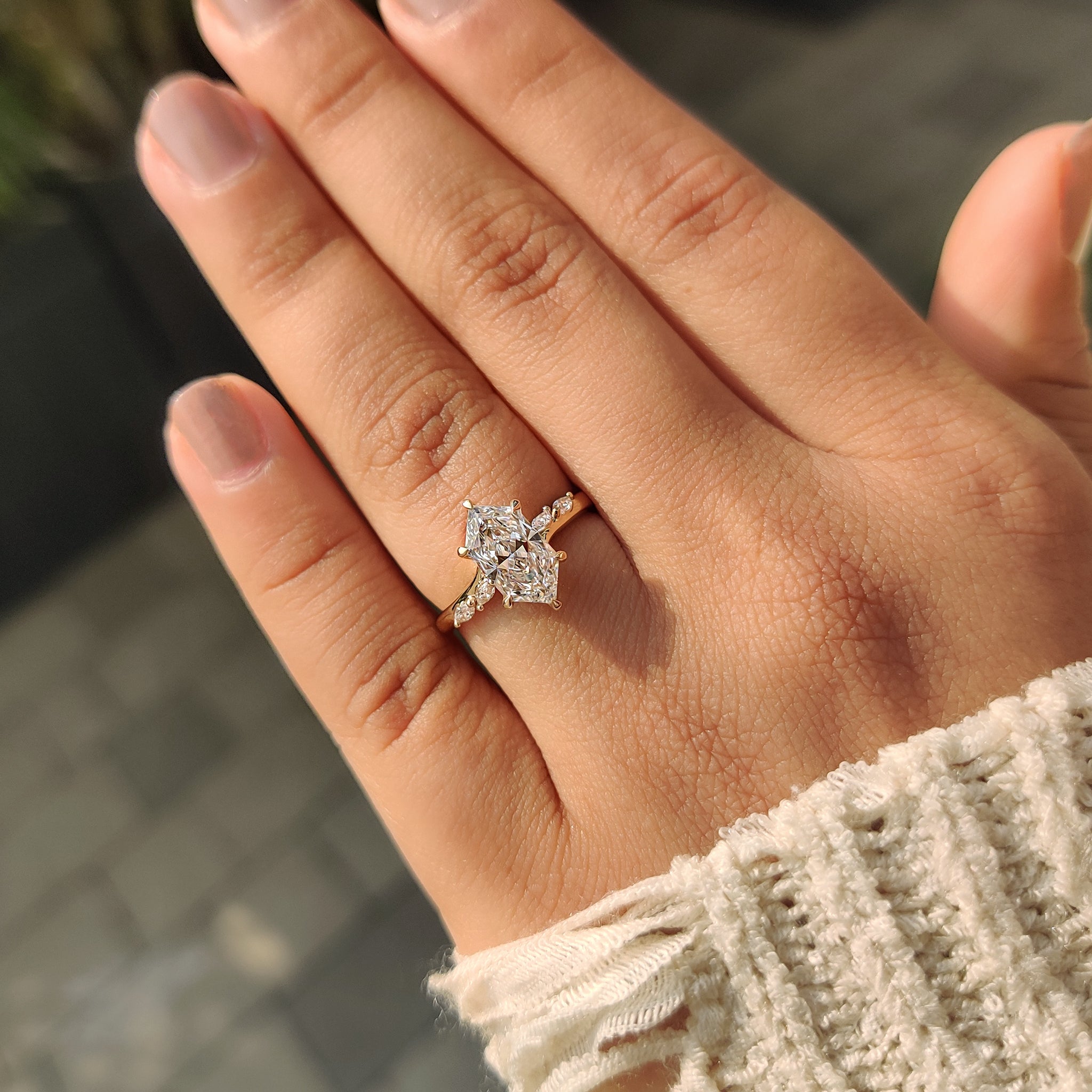 Six claw prong setting on a custom engagement ring.
