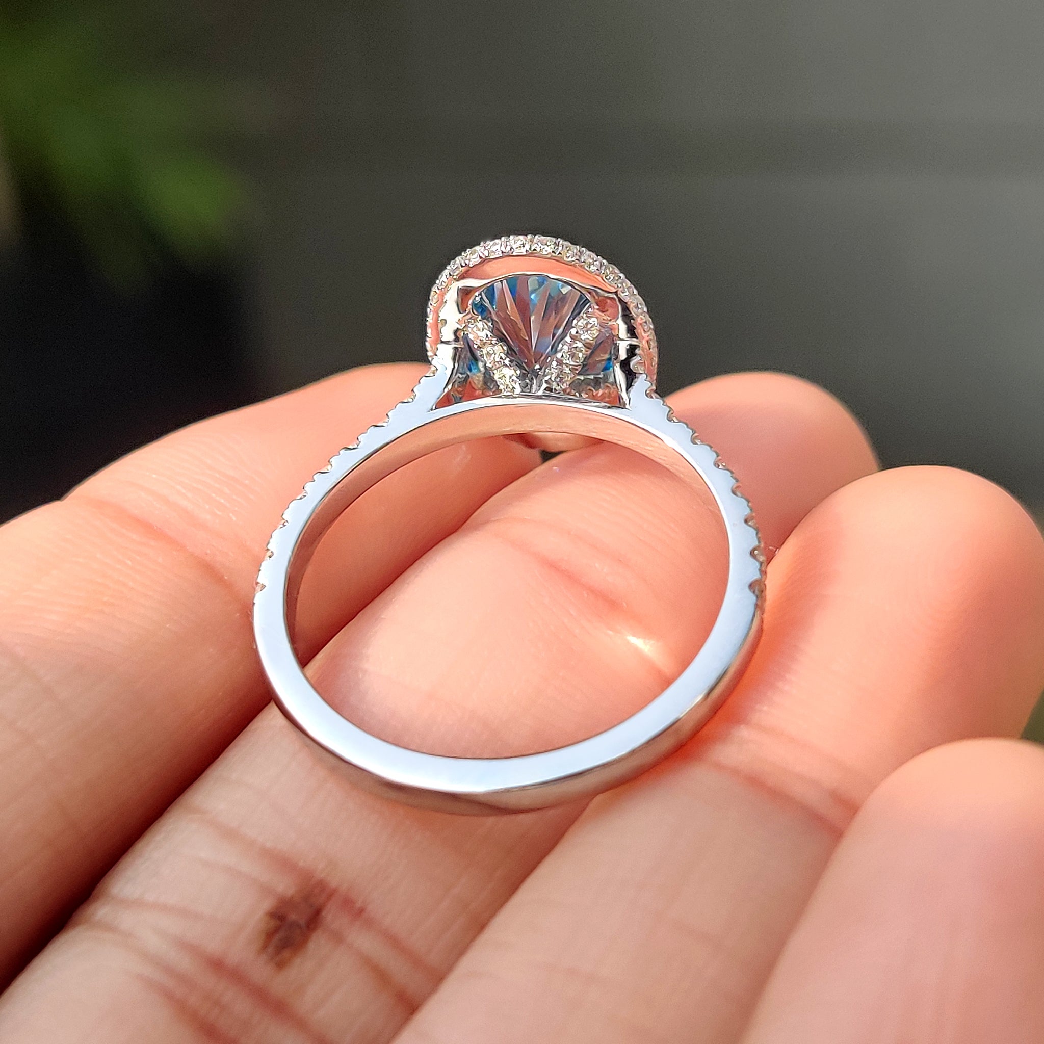 Custom blue oval diamond engagement ring
