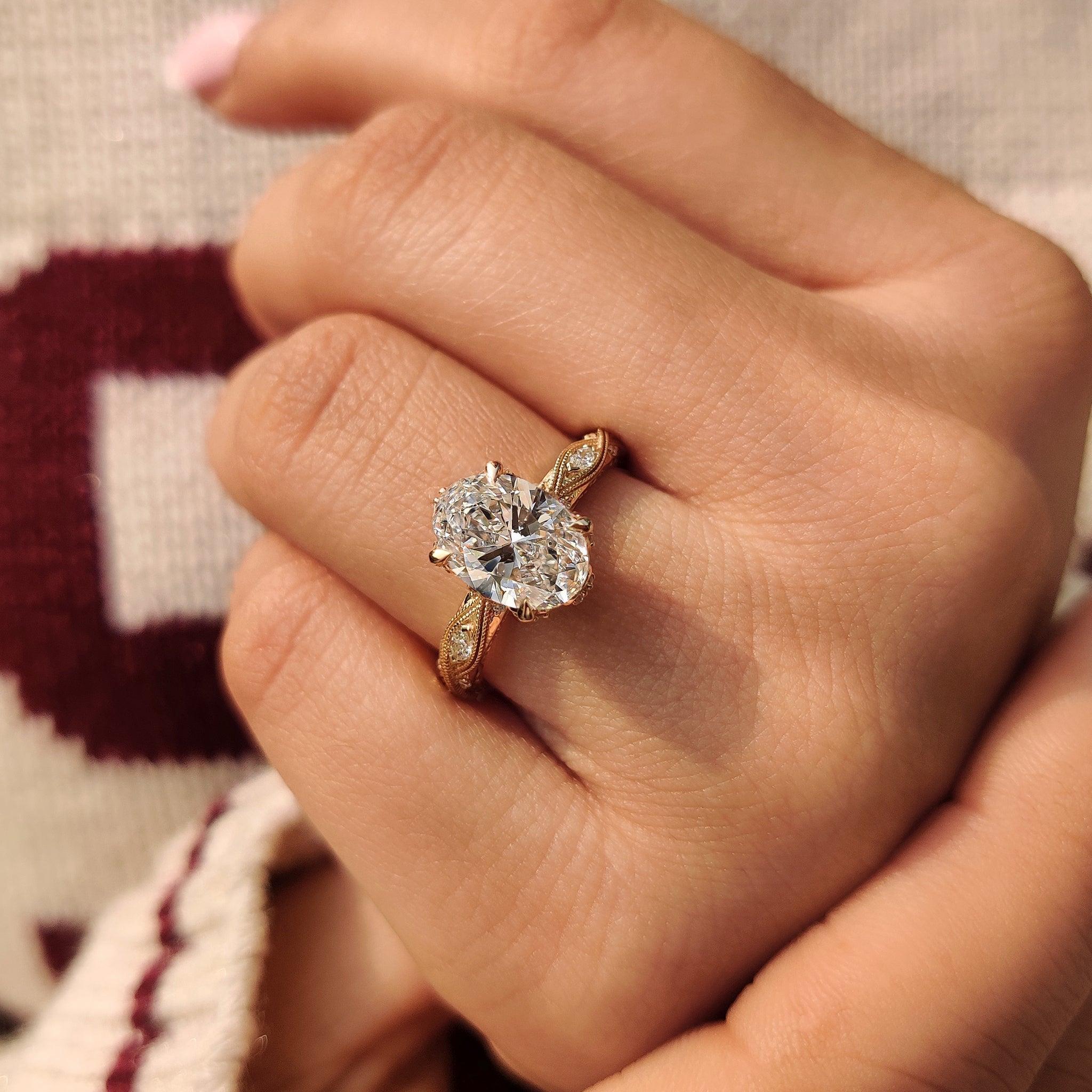 Oval cut diamond handmade ring creation.
