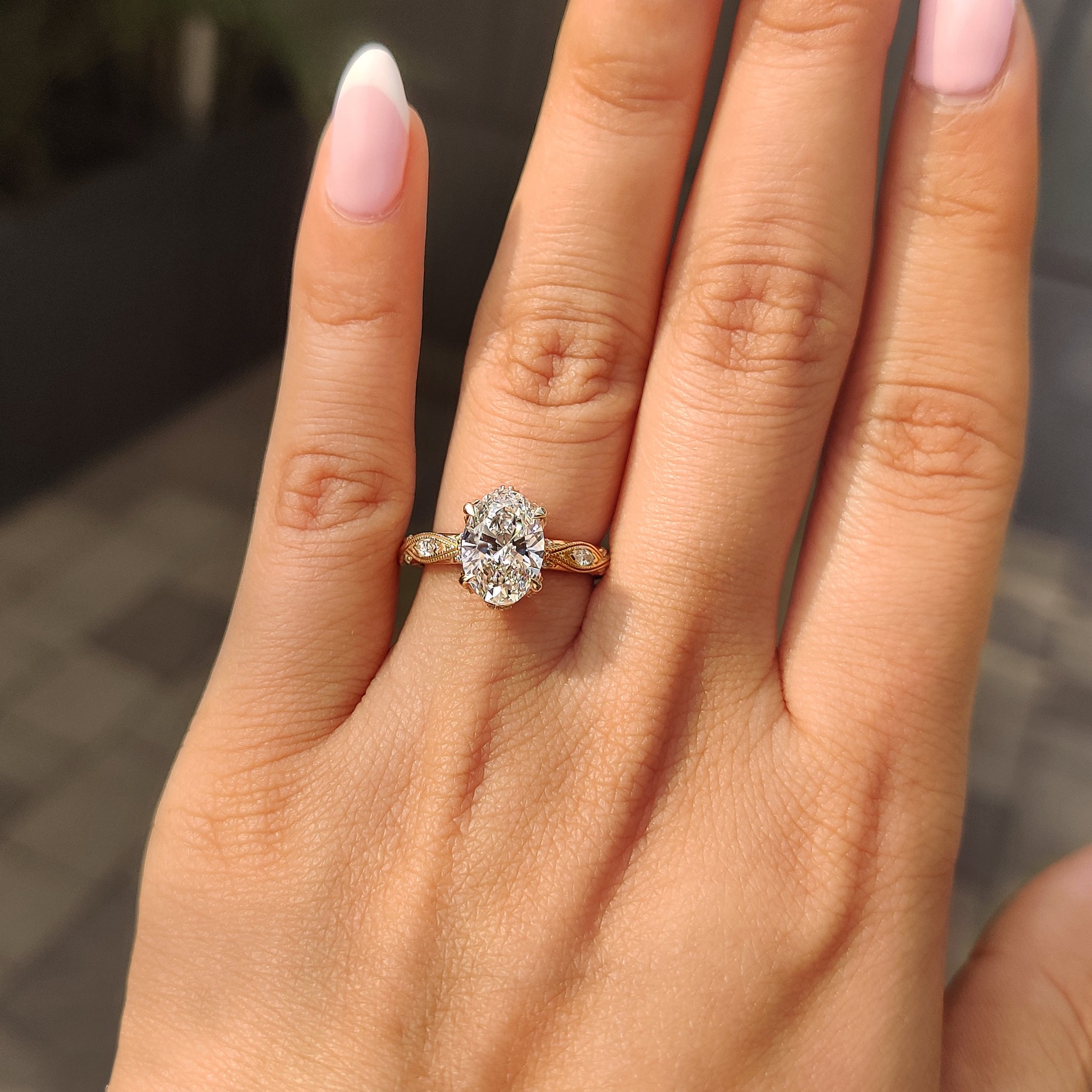 Art deco oval ring featuring 4 claw prong setting.

