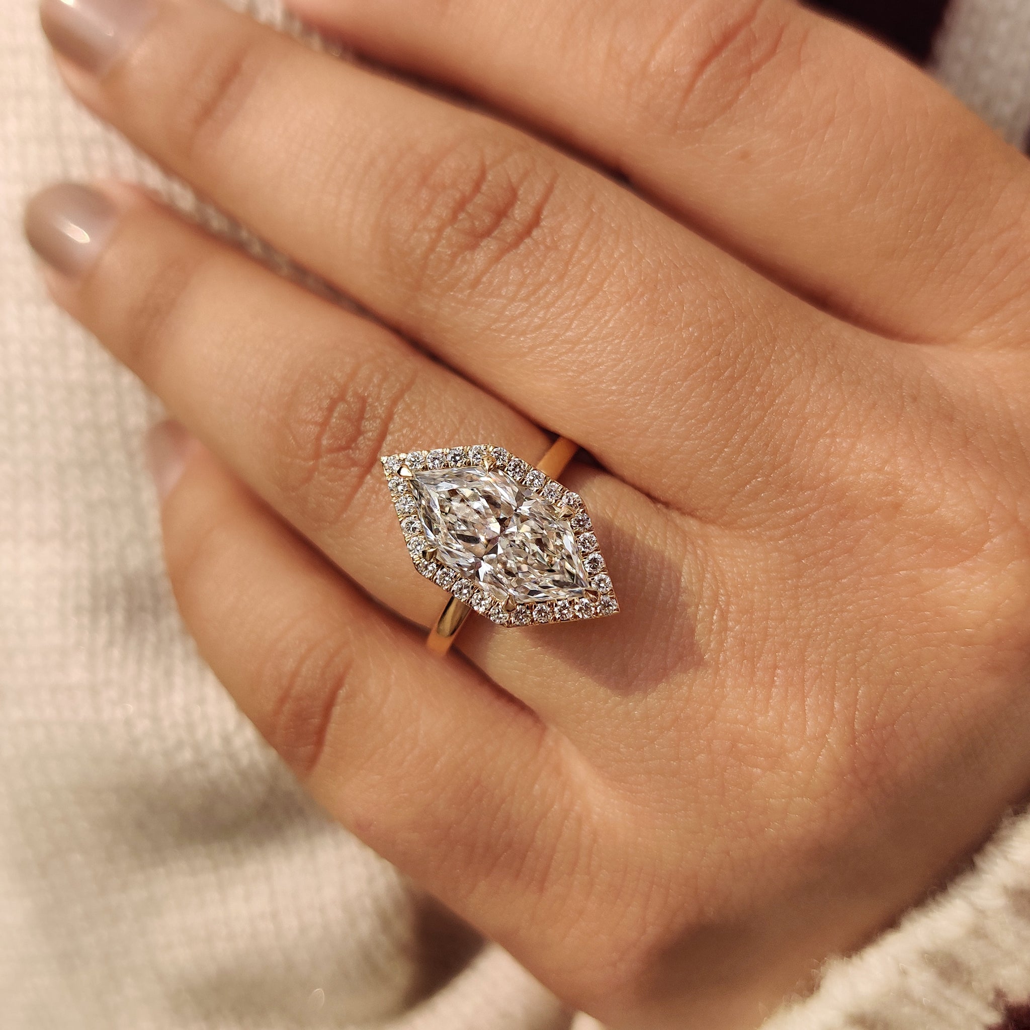 Custom marquise diamond engagement ring
