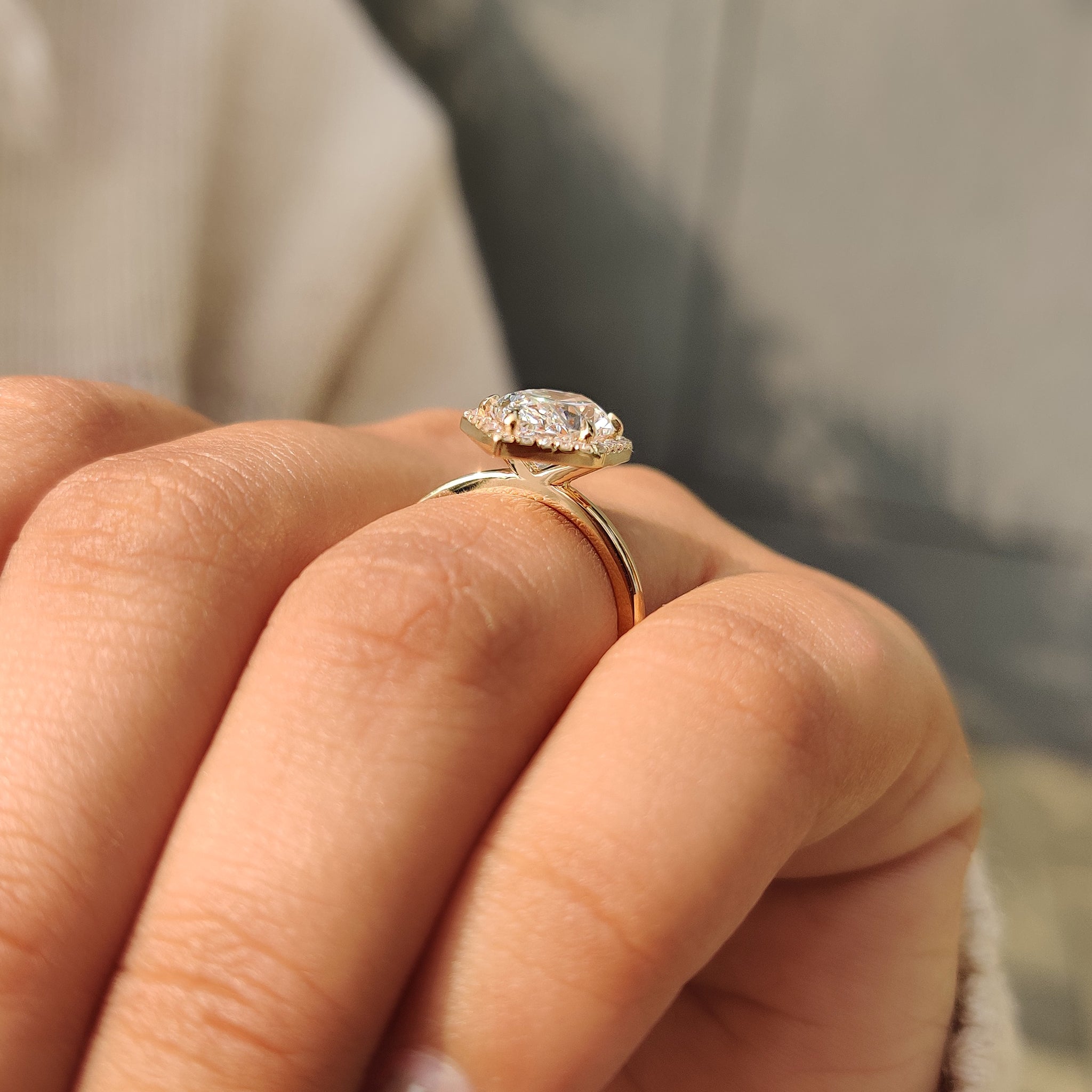Yellow gold marquise engagement ring with halo
