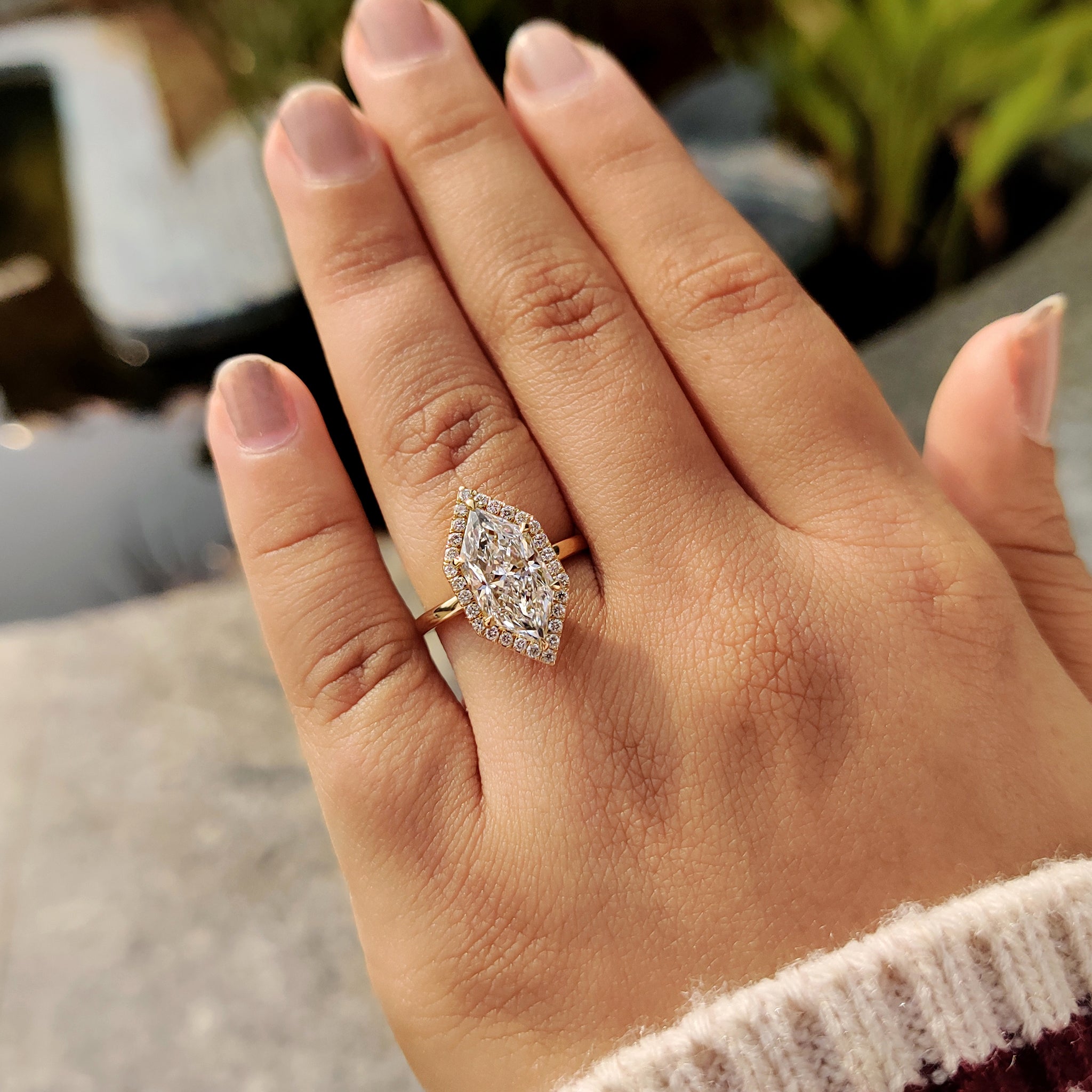 Handmade marquise halo engagement ring
