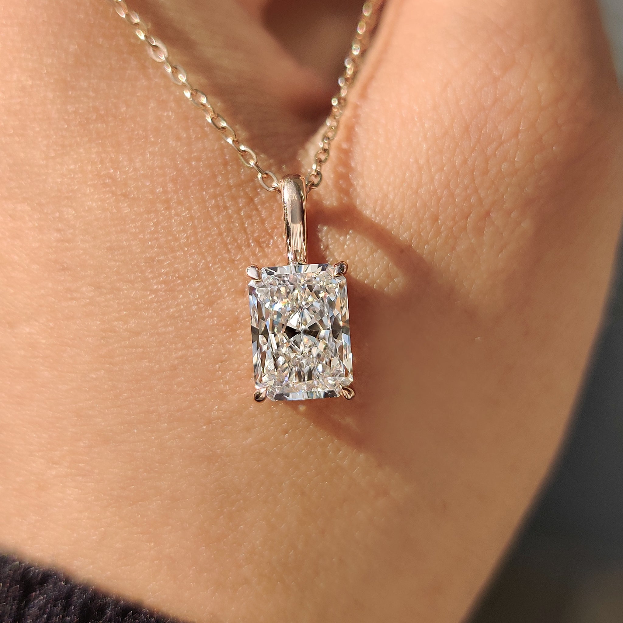 Carat Diamonds pendant in radiant cut pendant.
