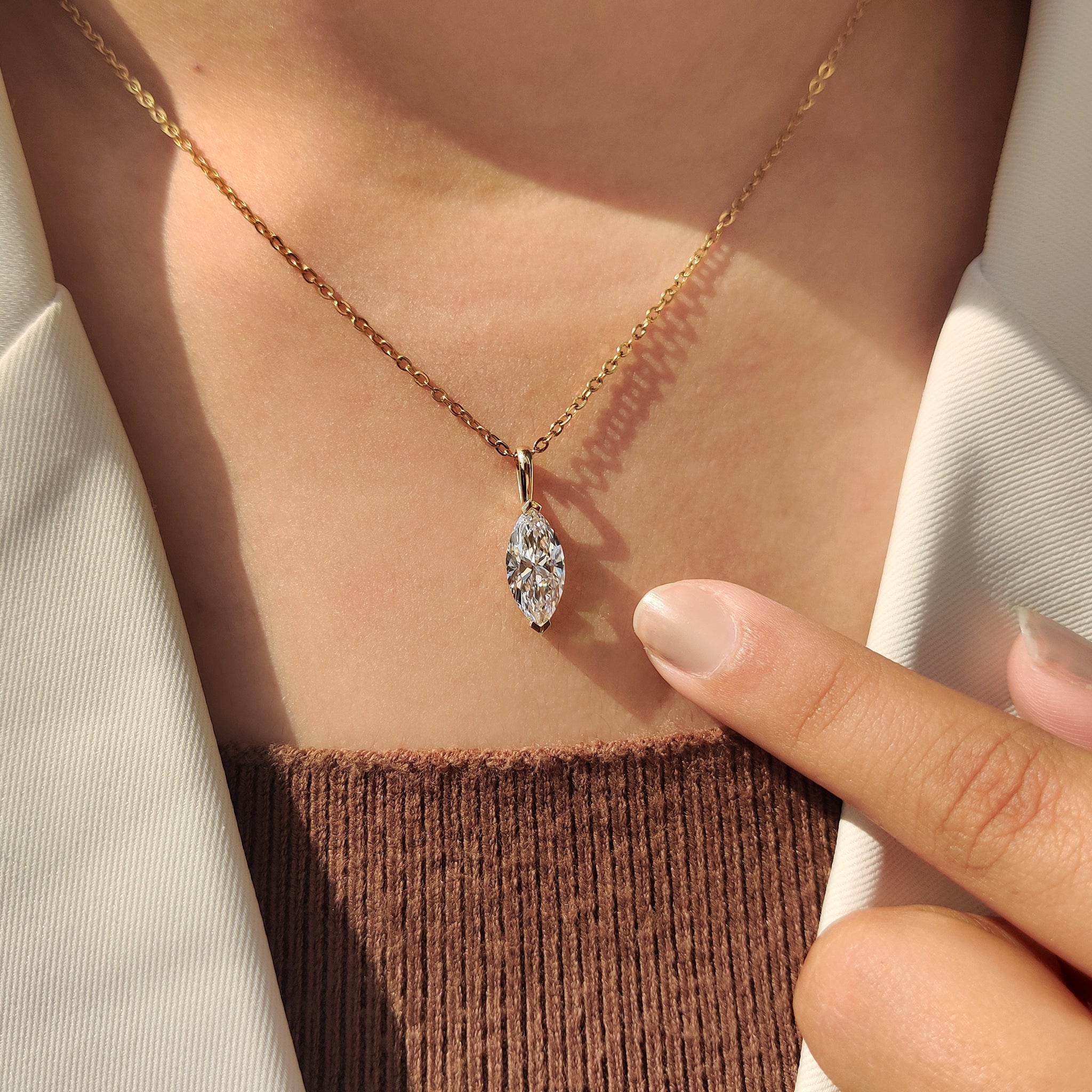 Lab Grown Diamond in handmade pendant.
