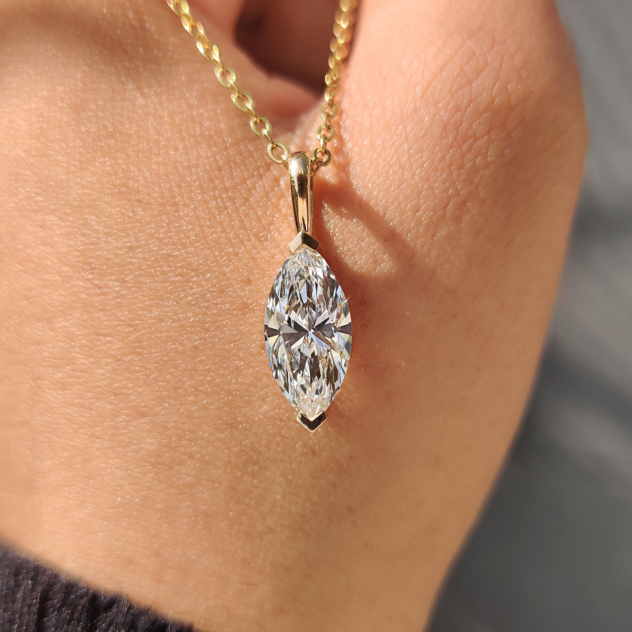 Buy diamond pendant with marquise diamond pendant.
