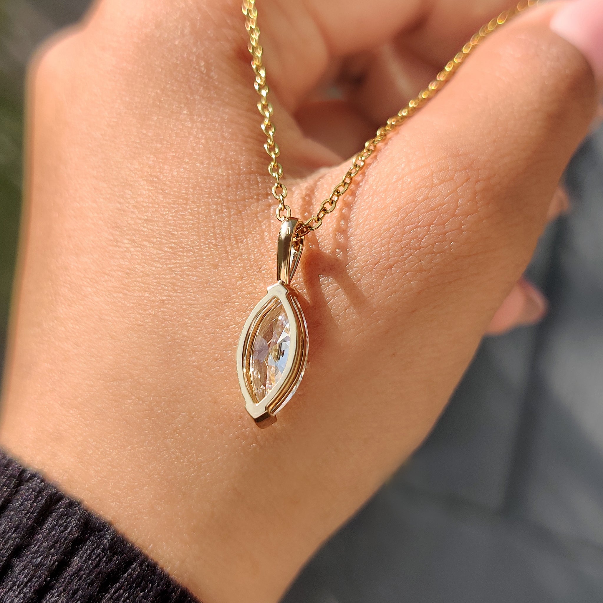 Handmade jewelry with Carat Diamonds pendant.
