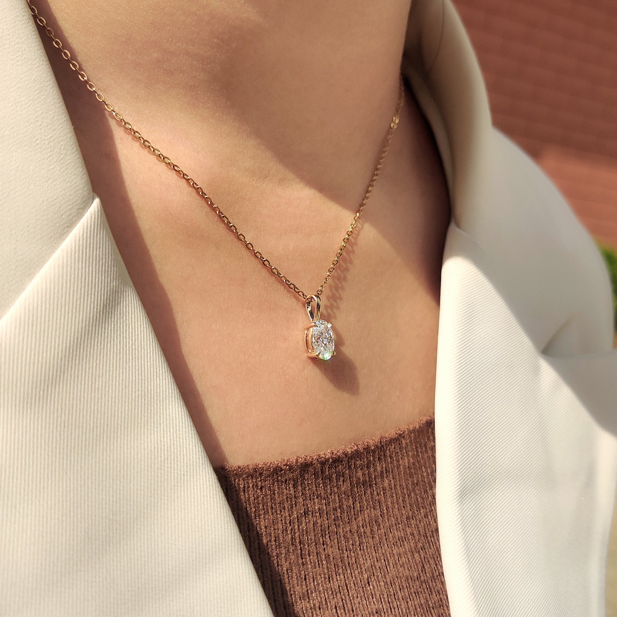 Yellow gold pendant featuring unique diamond pendant.
