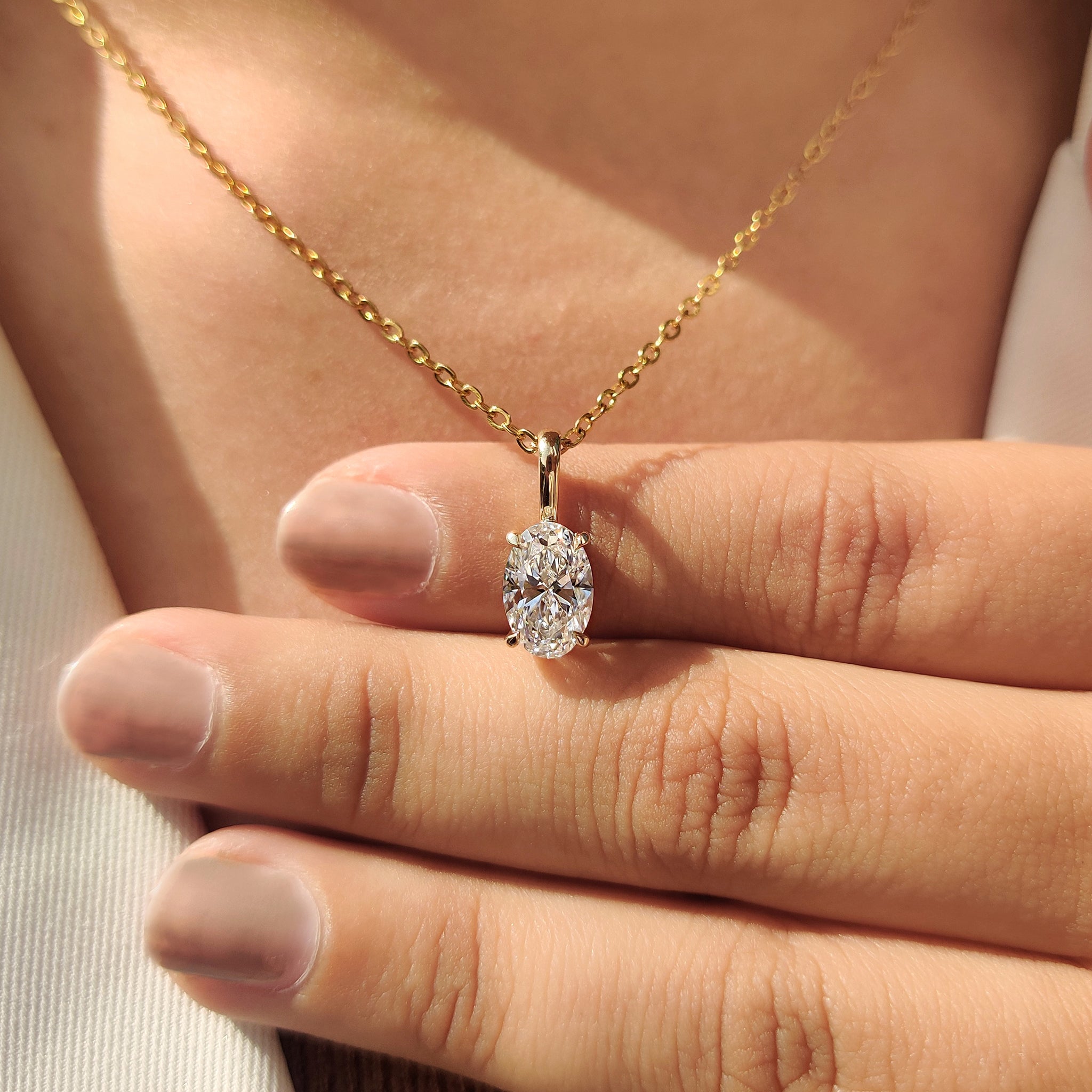 Lab Grown Diamond in handmade pendant.
