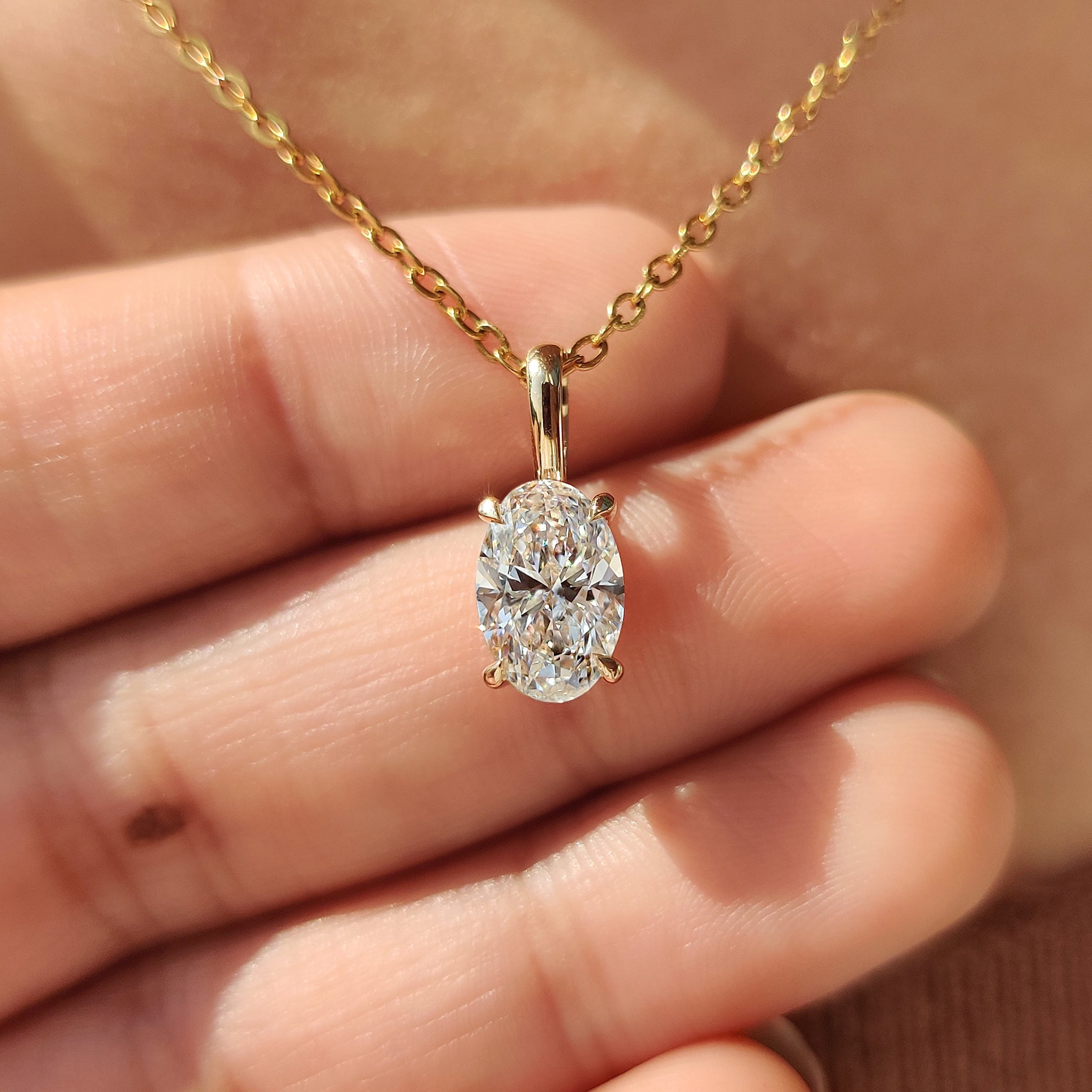 Handmade jewelry with Carat Diamonds pendant.
