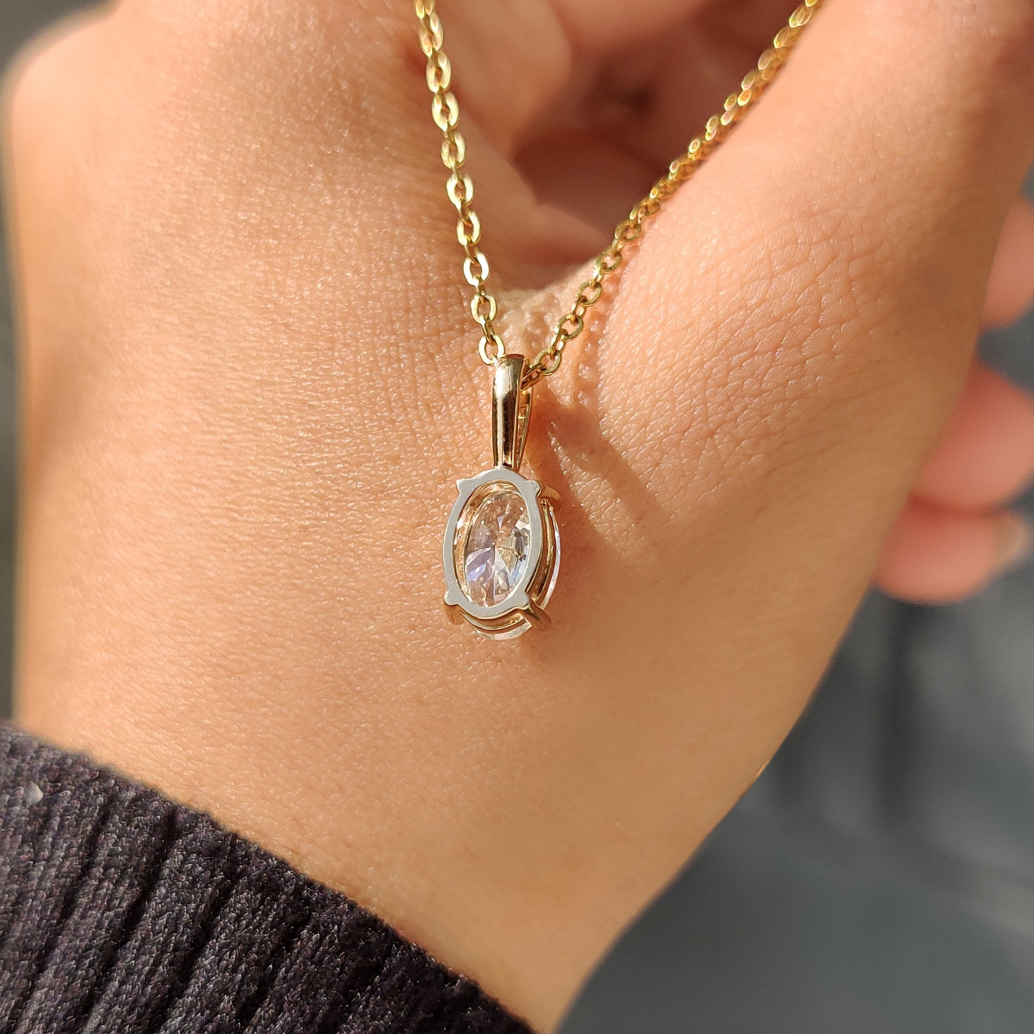 Handmade pendant with four claw prong setting.
