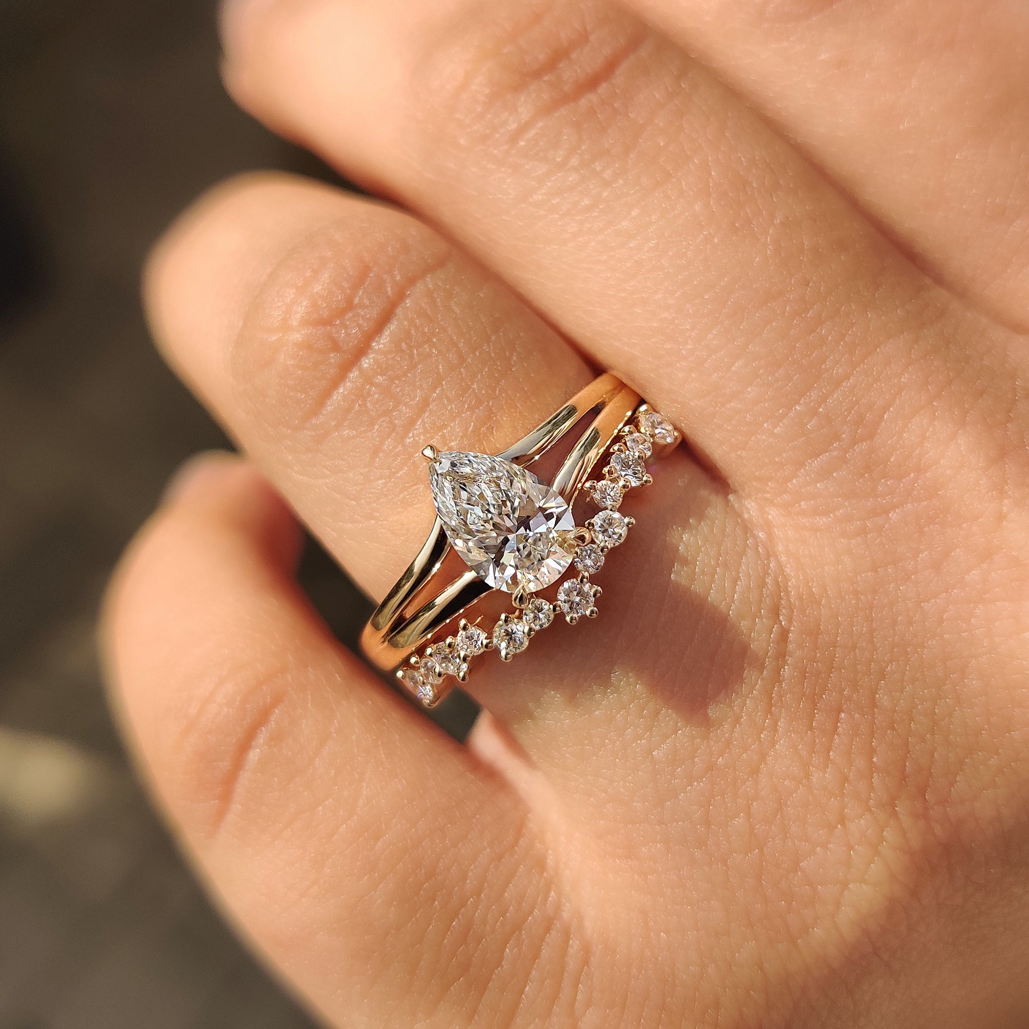 Three claw prong setting in round cut wedding band.
