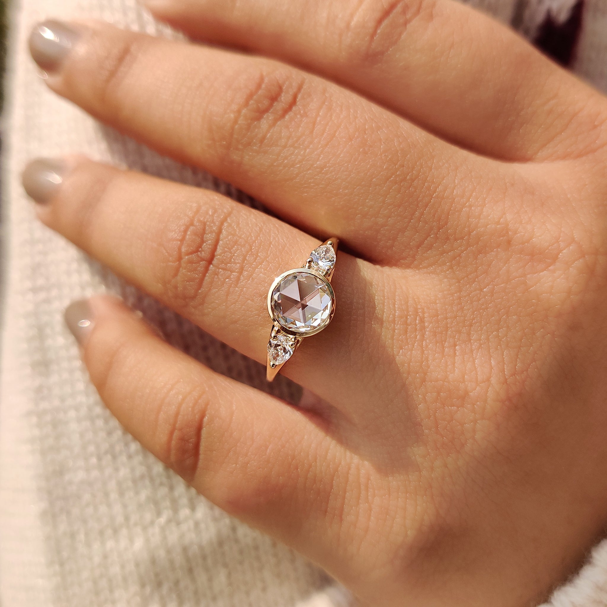 Rose cut diamond ring with a bezel setting.
