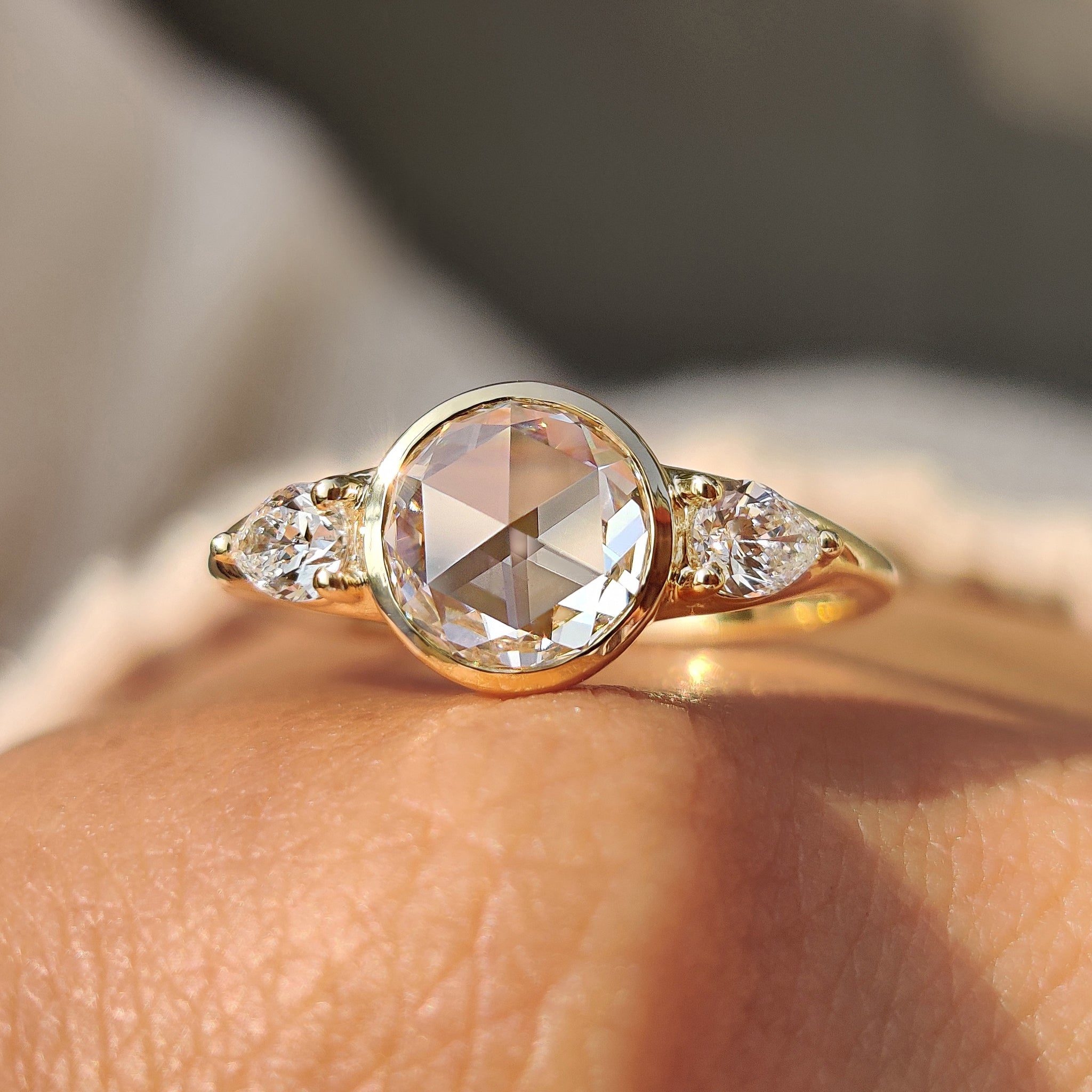 Diamond engagement ring with rose cut detailing.
