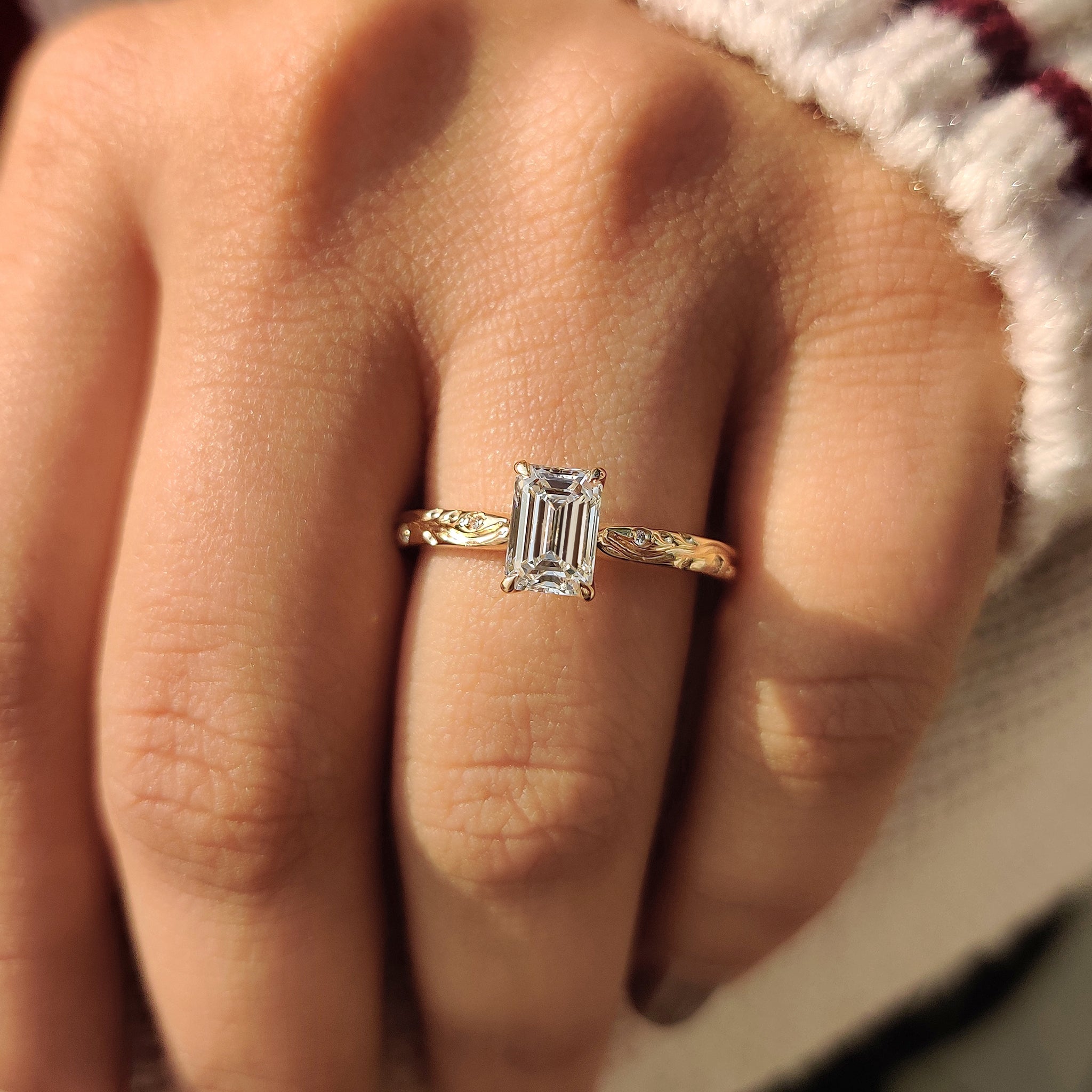 Custom-looking art deco style emerald cut ring.

