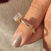 Handmade jewelry emerald cut engagement ring.
