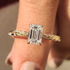Vintage emerald cut diamond ring in yellow gold.
