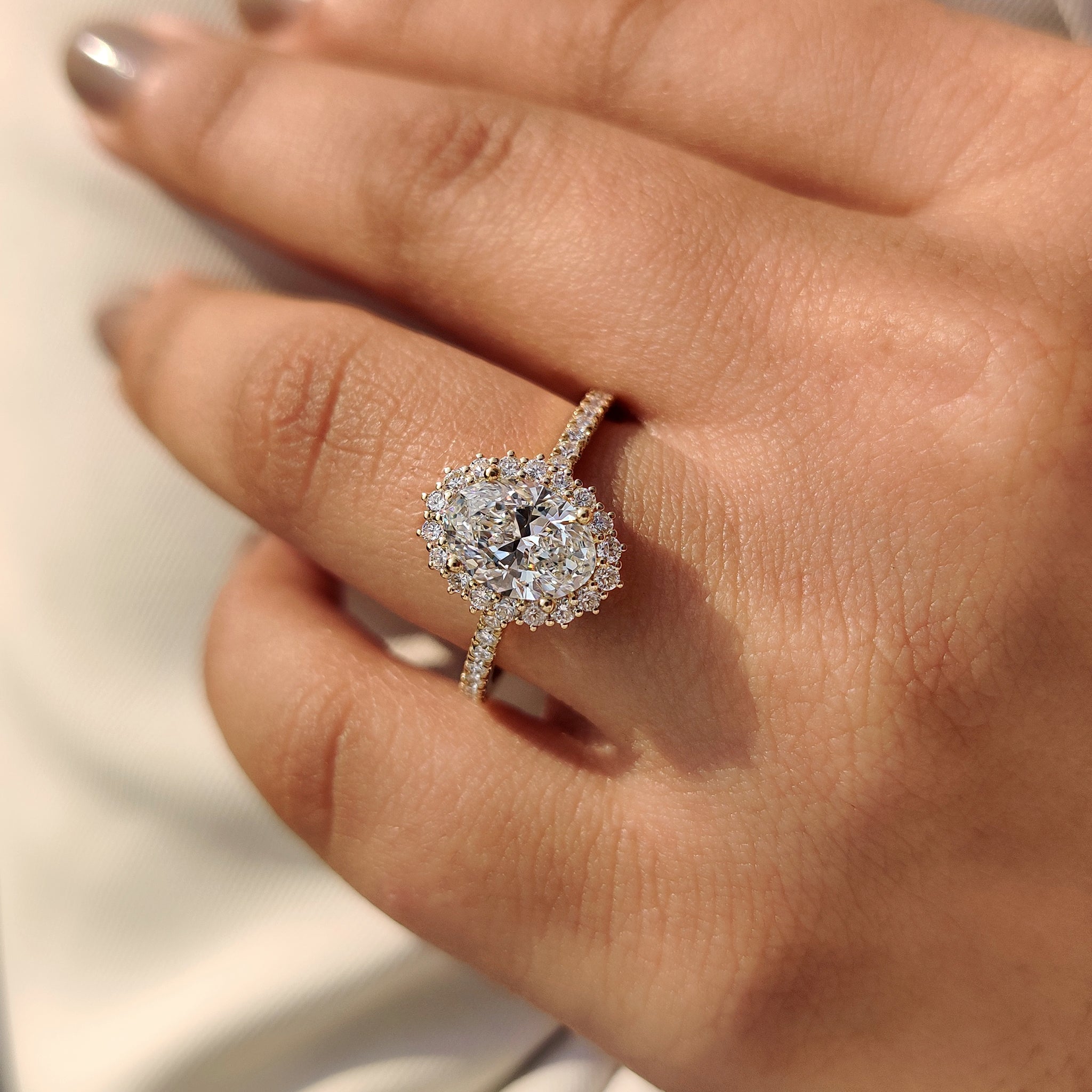 Cathedral setting ring with oval cut diamond.
