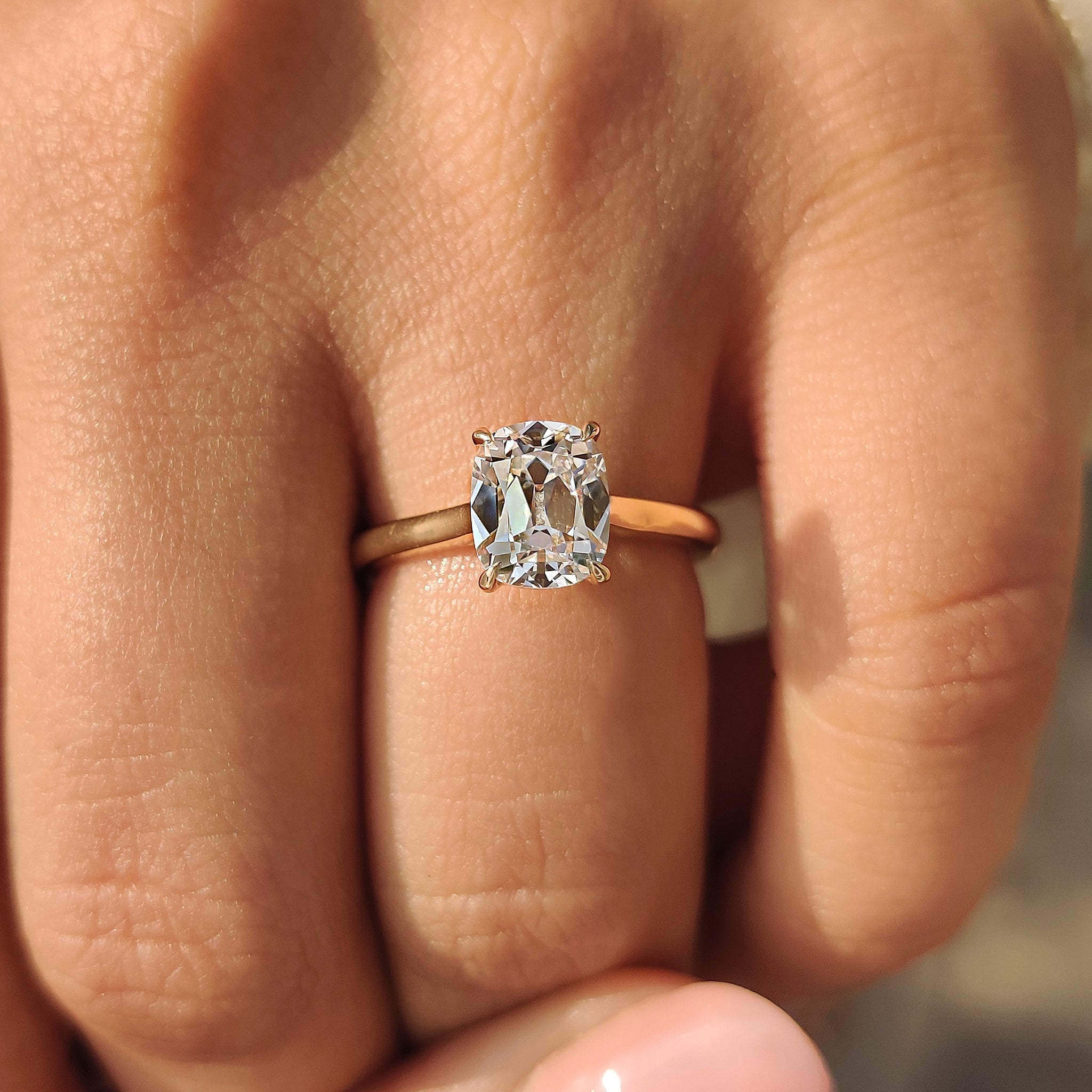 Cathedral setting on old european cut diamond ring with lab grown diamond.

