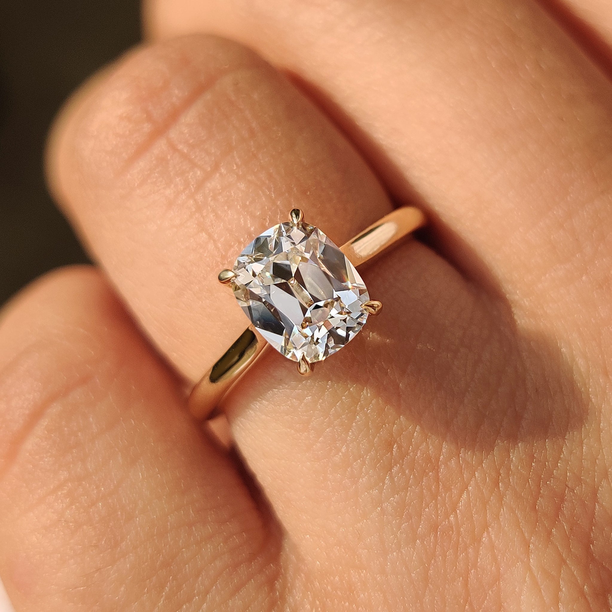 IGI certified old european cut diamond ring with cushion oec stone.
