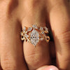 Leaf style prong cluster setting ring design.
