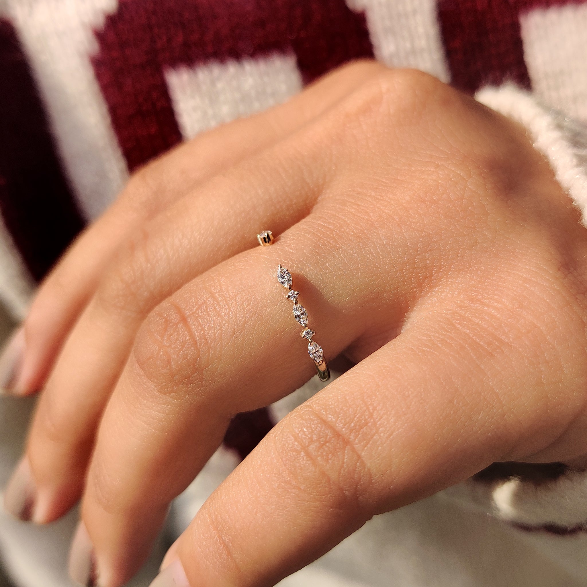 Half eternity band with round diamonds.
