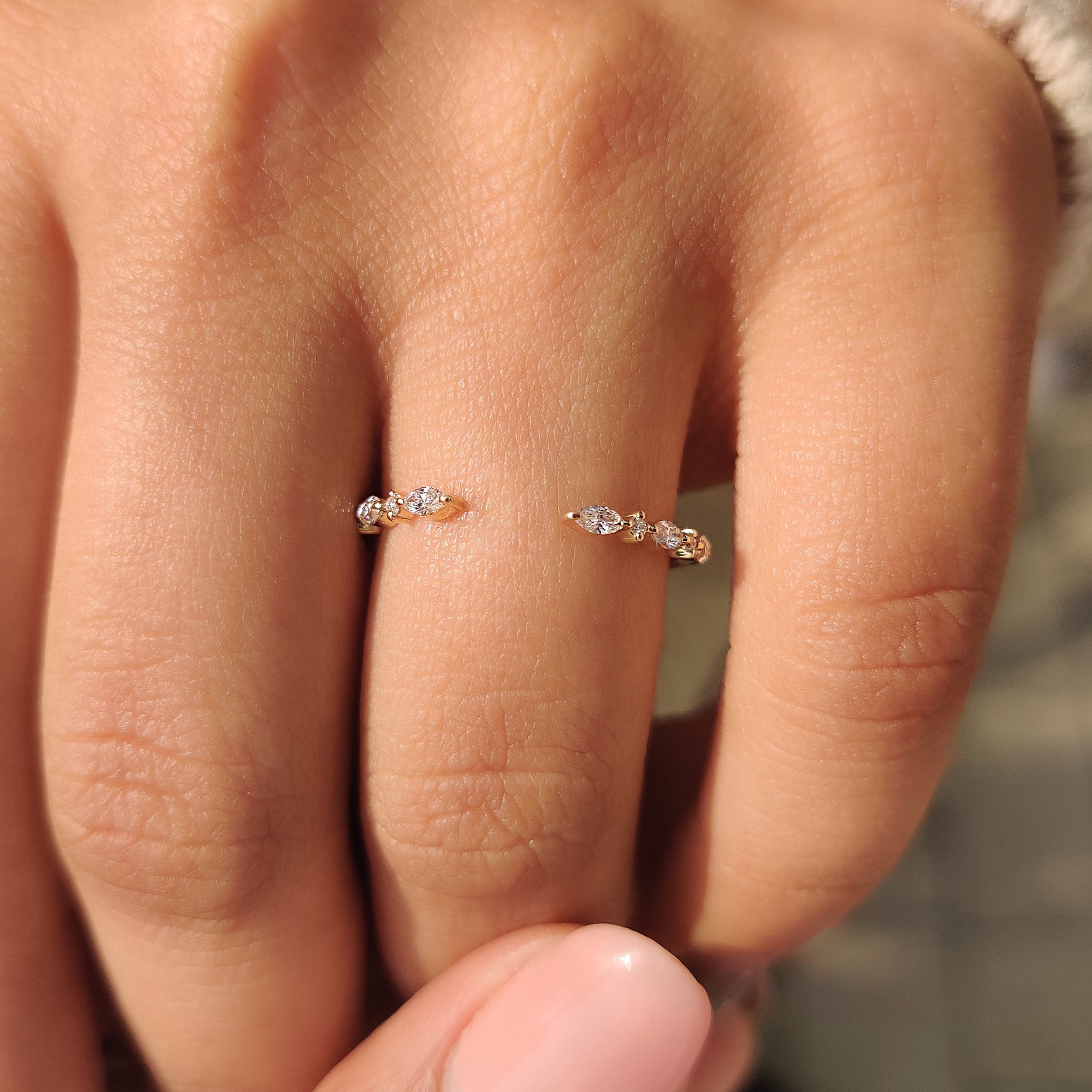 Open gap wedding band in yellow gold.
