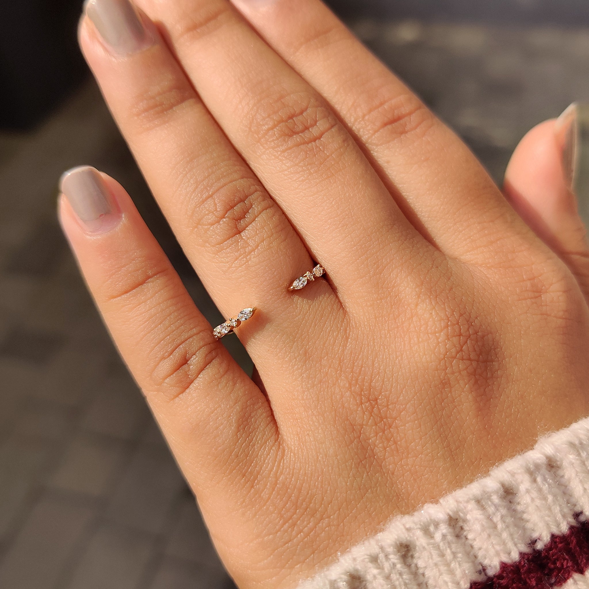 Yellow gold band with marquise diamonds.
