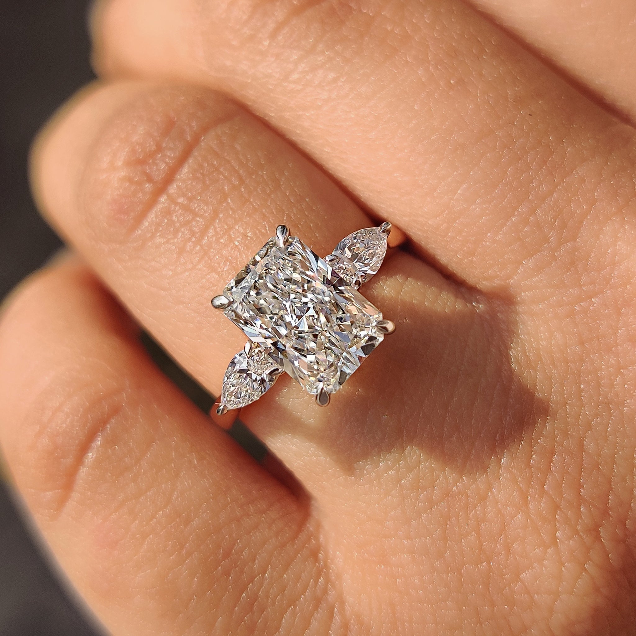 Handmade jewelry radiant cut diamond engagement ring.
