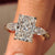 Two Tone Radiant Cut Diamond Ring With Pear Side Stones
