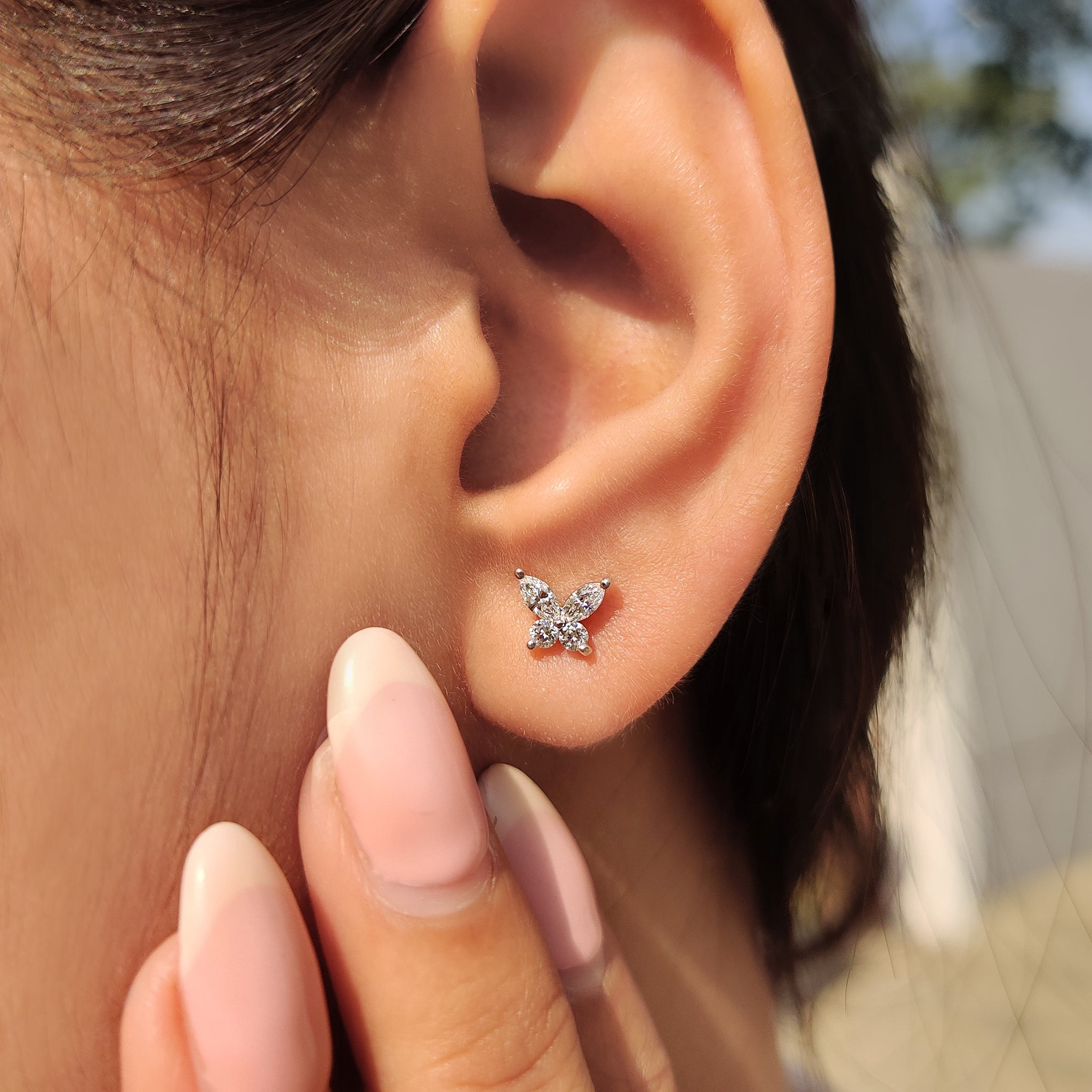 Lab grown diamond butterfly stud earrings.
