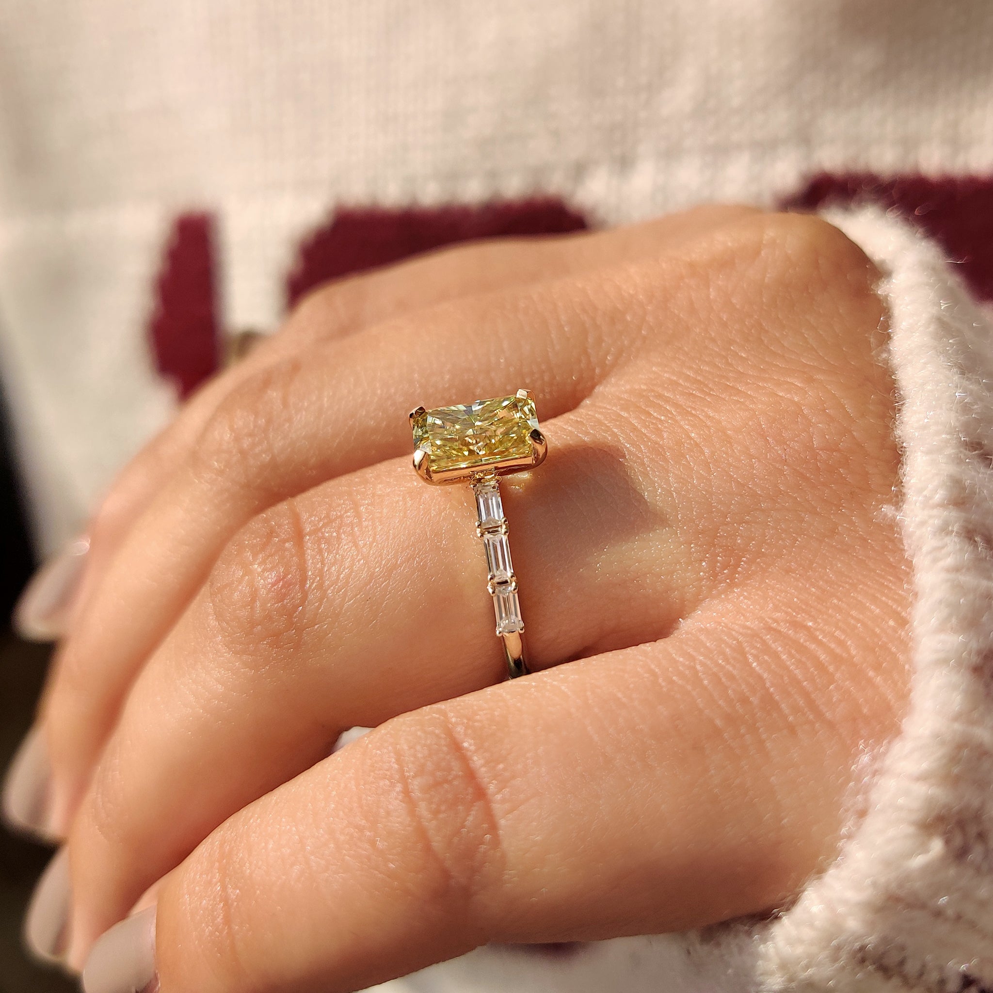 Yellow moissanite ring inspired by carat diamonds engagement ring style.
