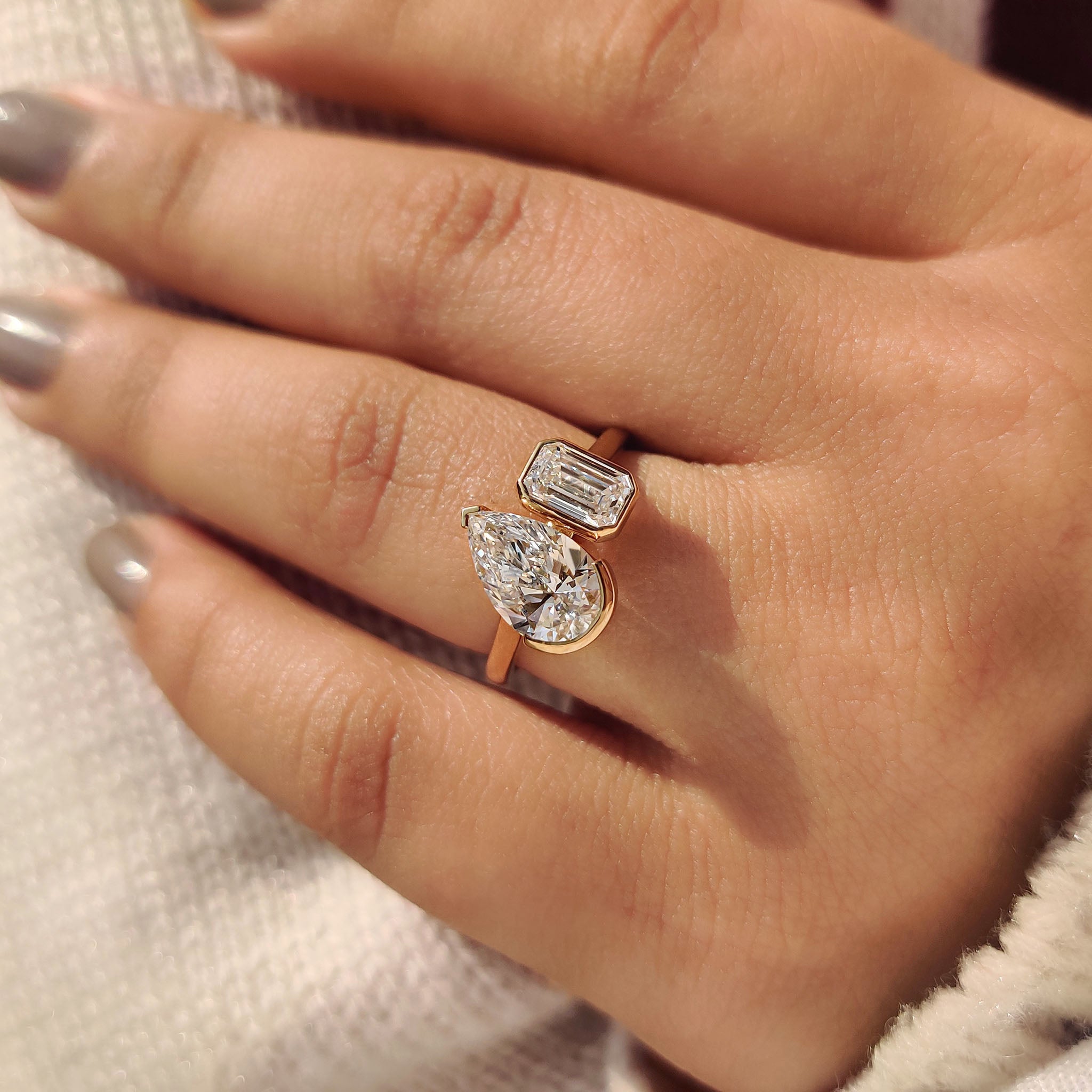 Pear cut engagement ring with a v-prong setting.
