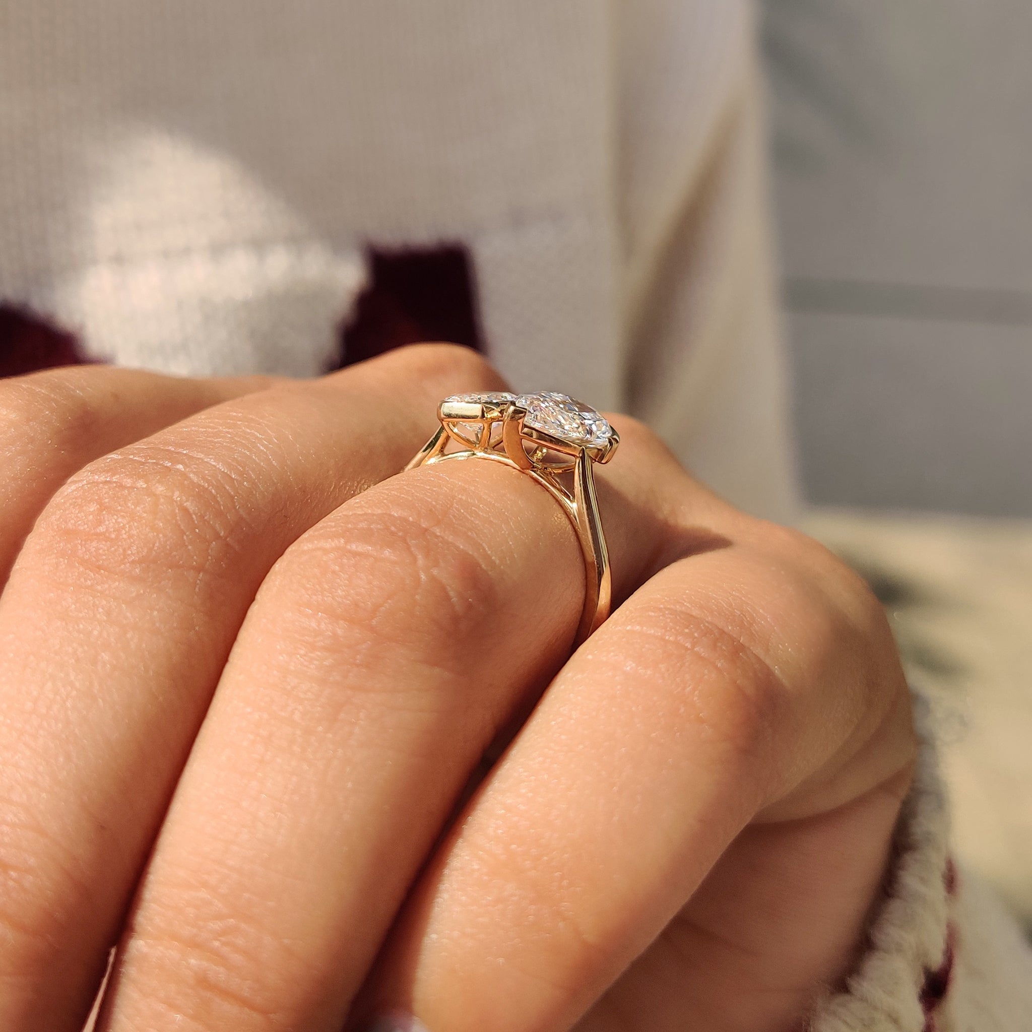 Diamond engagement ring with a bezel setting.
