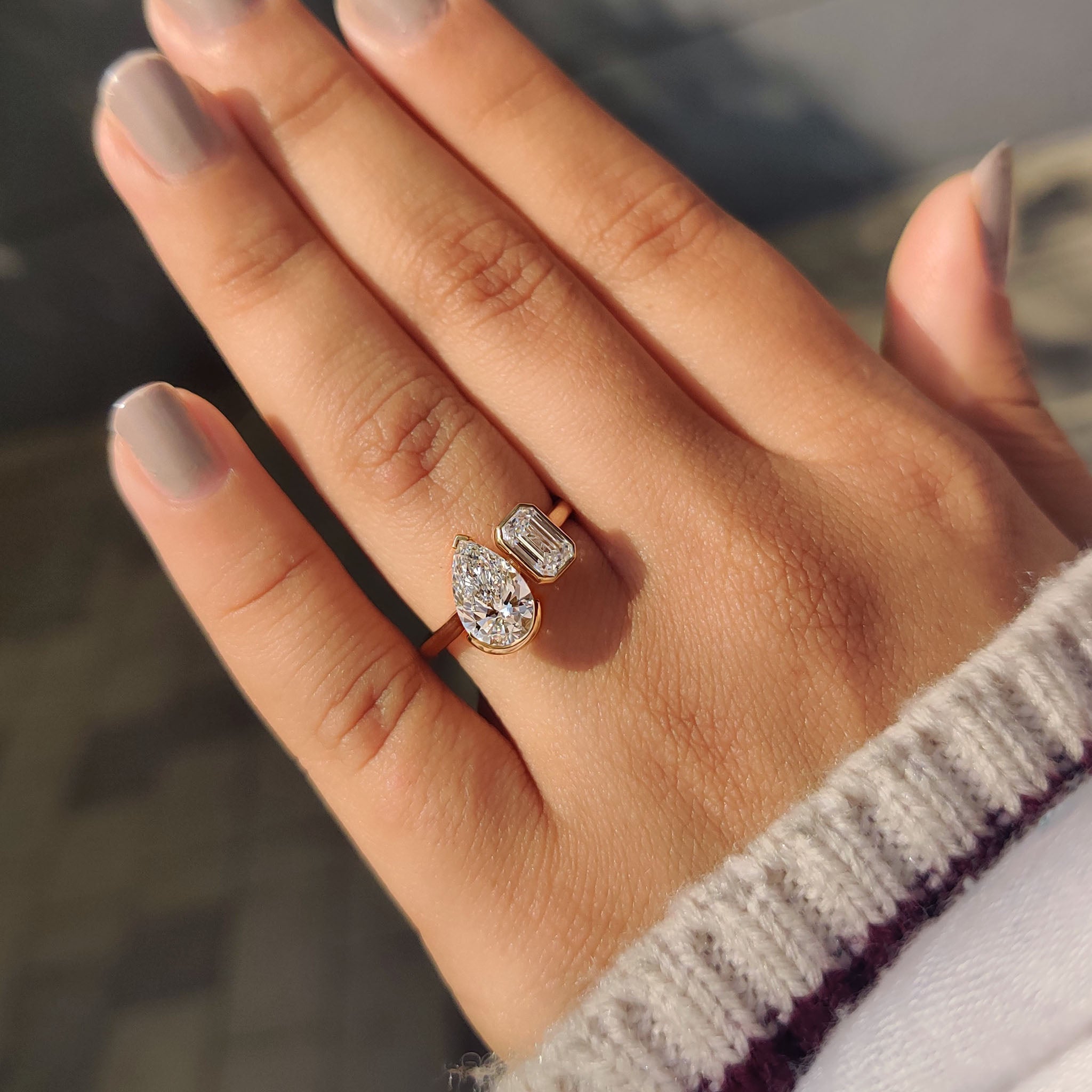 Two stone ring crafted in yellow gold.
