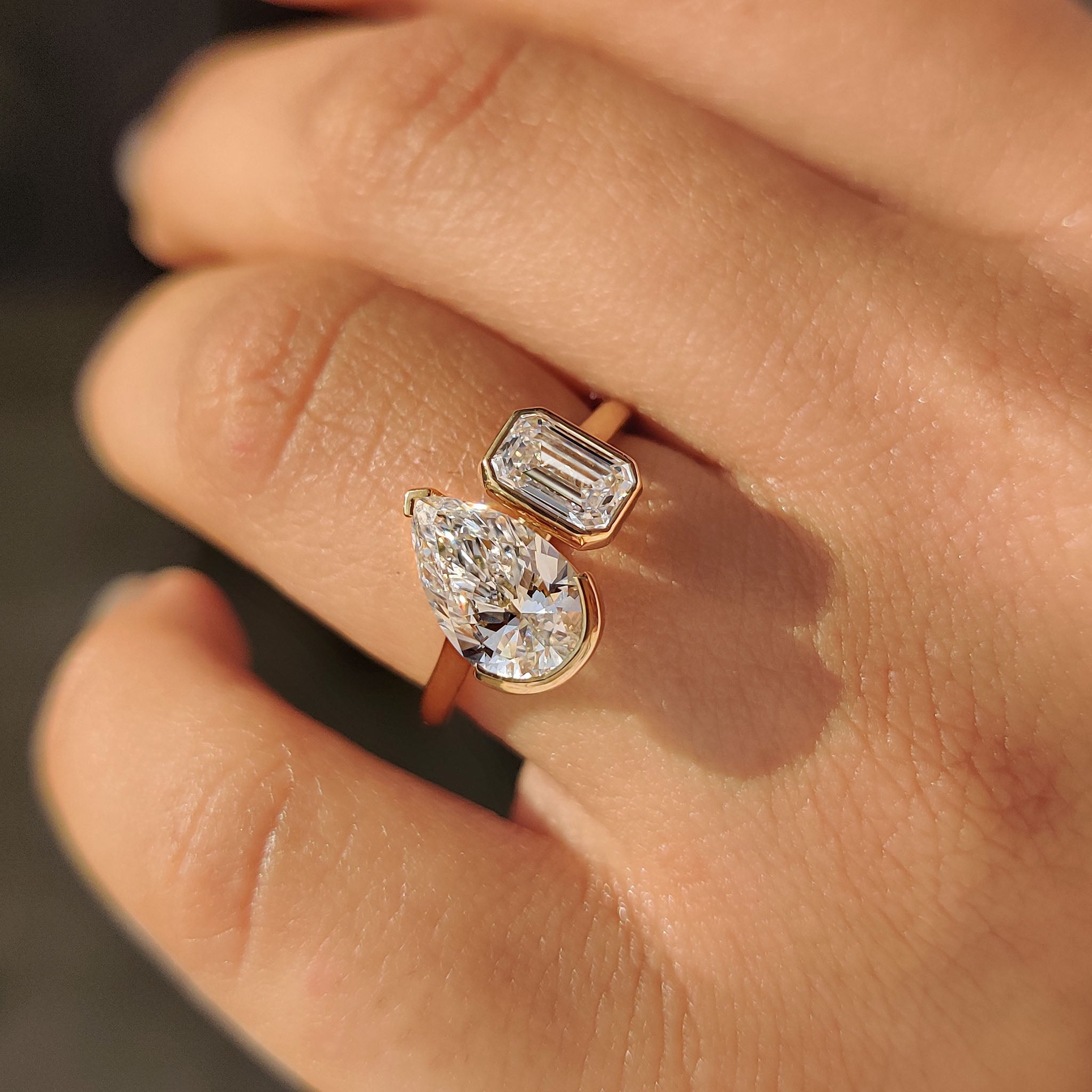 Buy diamond ring with two stone design.
