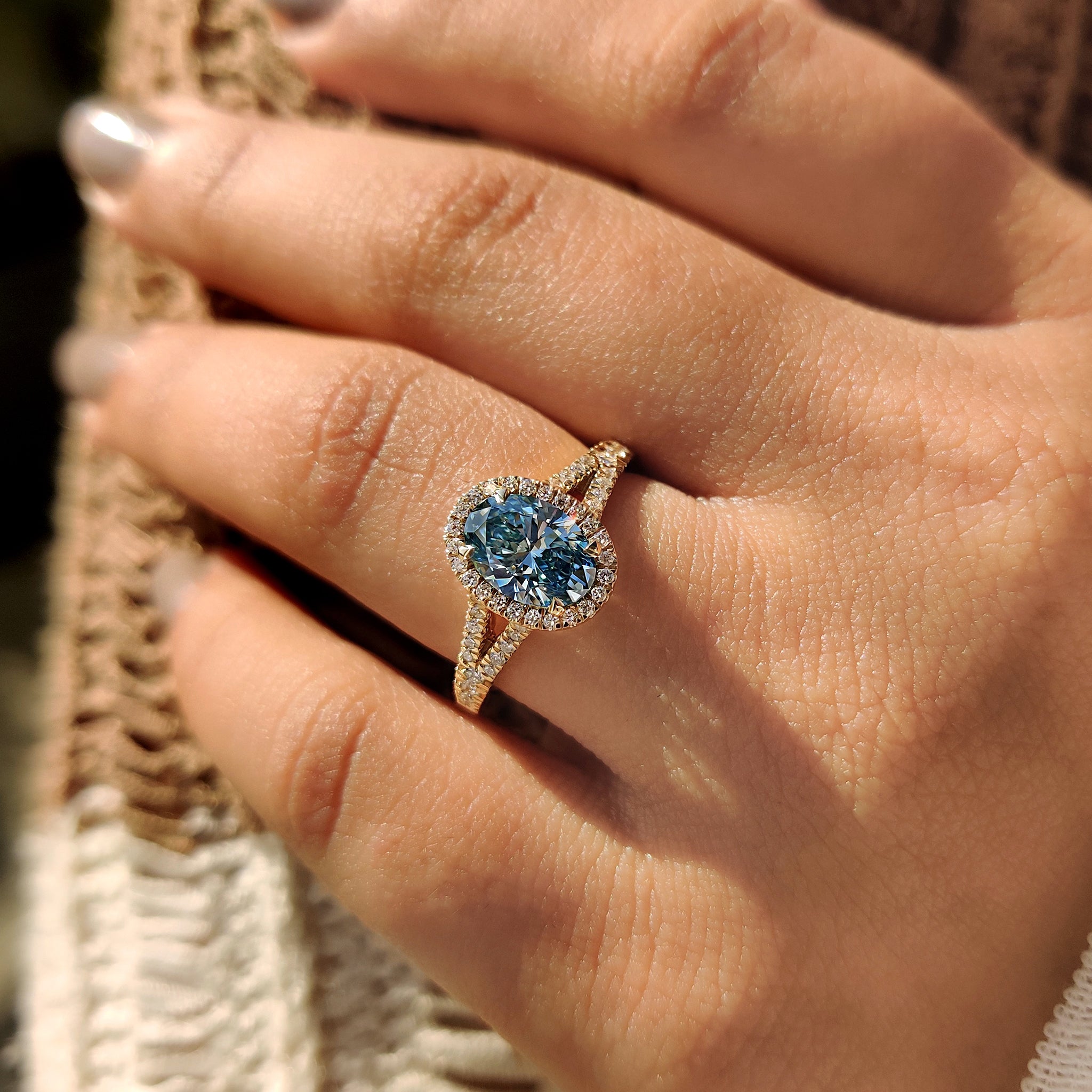 Carat Diamonds oval engagement ring with split shank.
